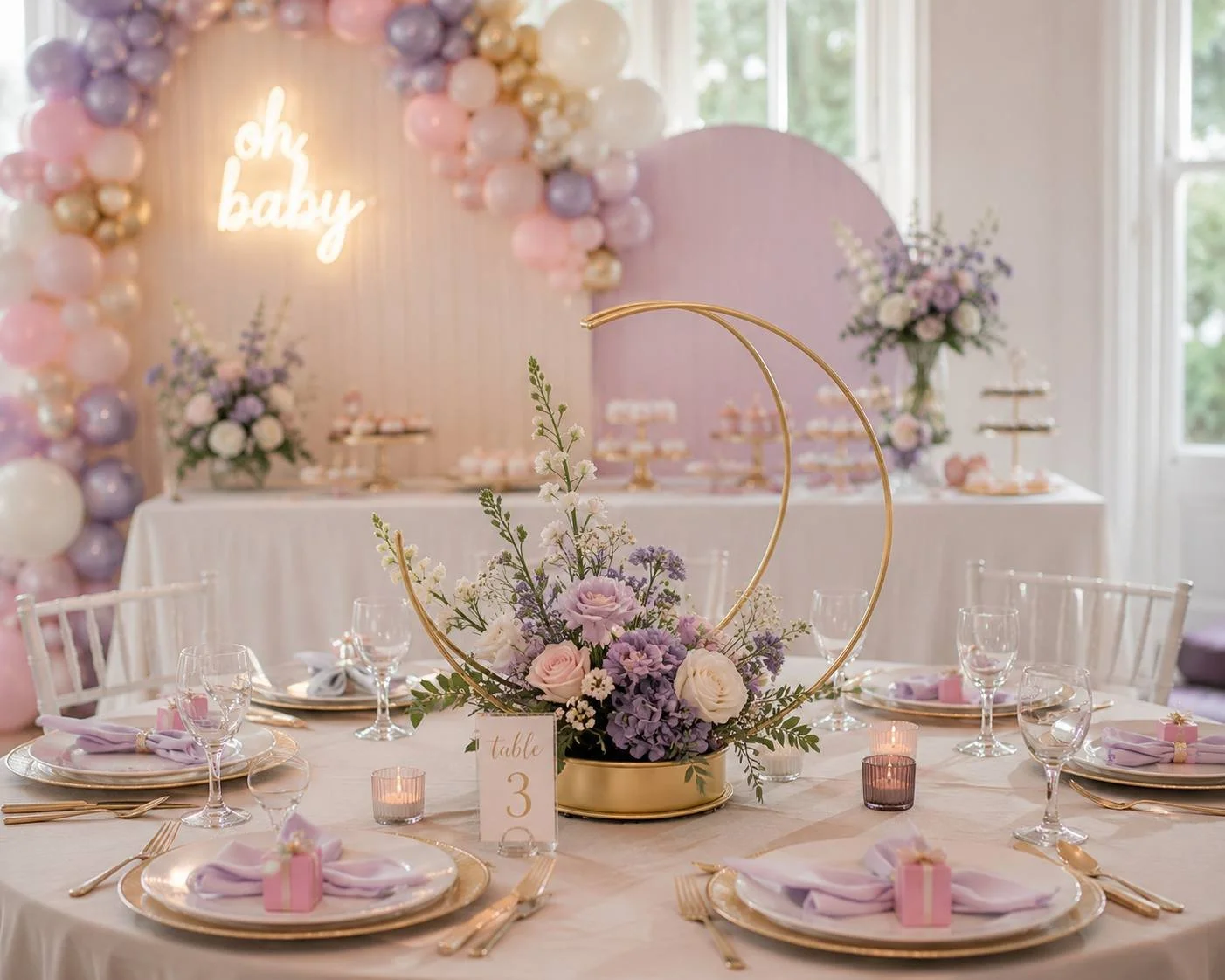 Pink and gold floral centerpiece for wedding reception table