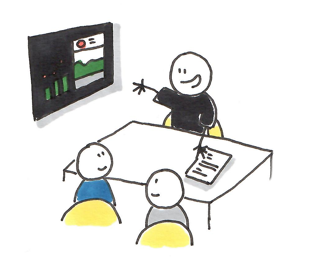 A person leading a meeting with two seated participants in a conference room, with a presentation on a wall screen showing graphs and charts.