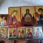 Collection of religious icons depicting saints and biblical figures, painted in traditional Byzantine style.