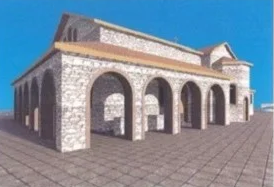 Historic stone building with arched doorways and a tiled roof under a clear blue sky.