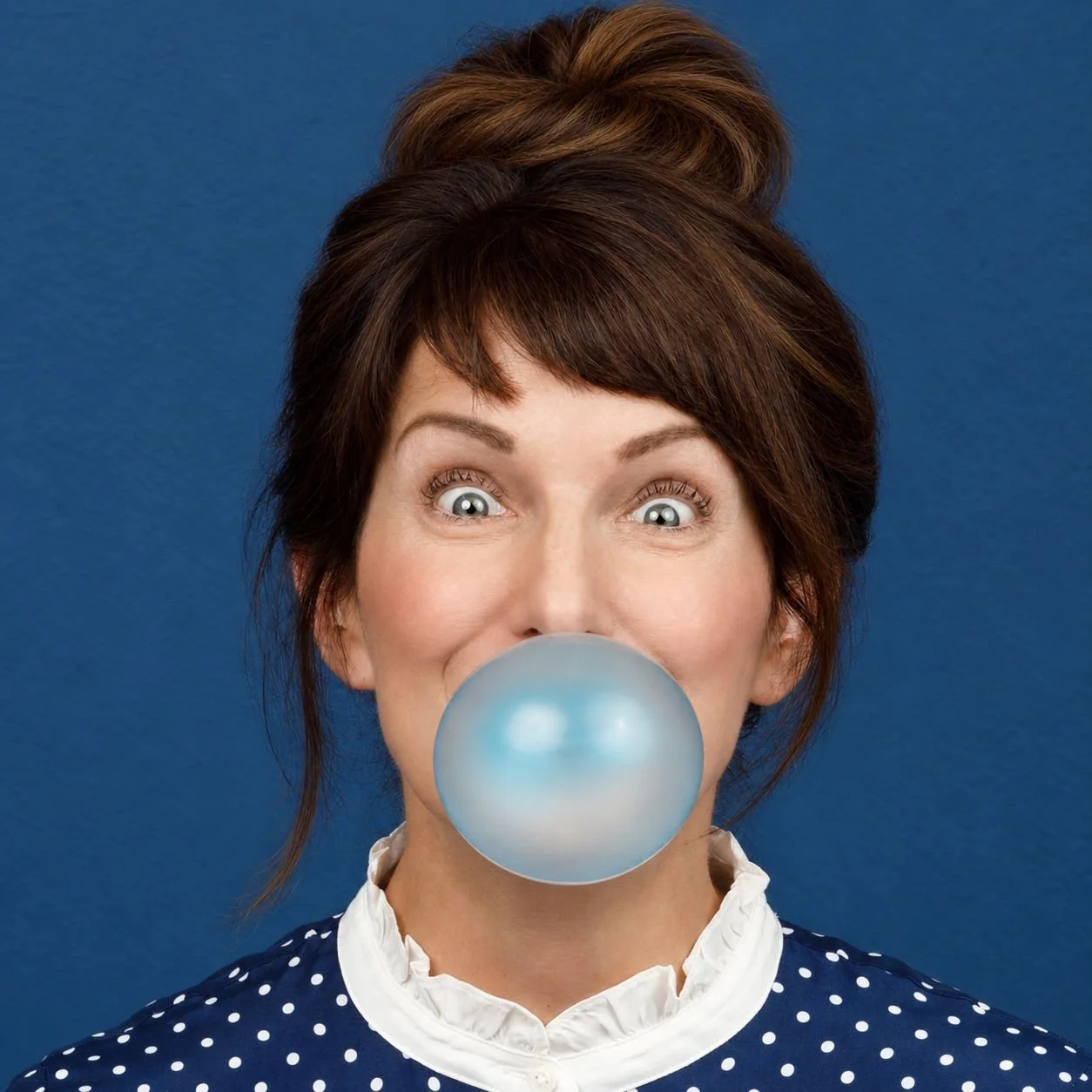 Carol Bruess Blowing bubble gum