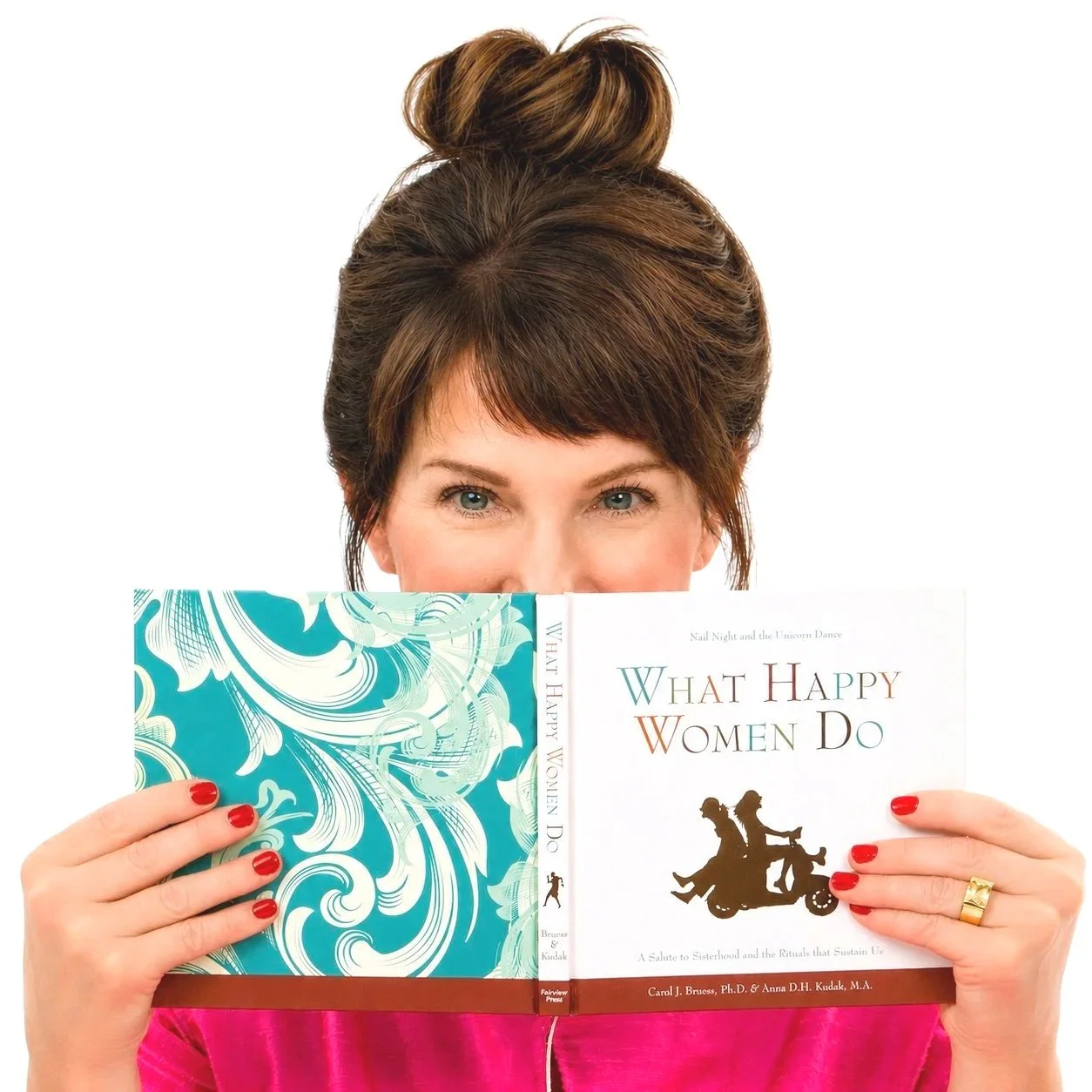 Carol Bruess holding What Happy Women Do