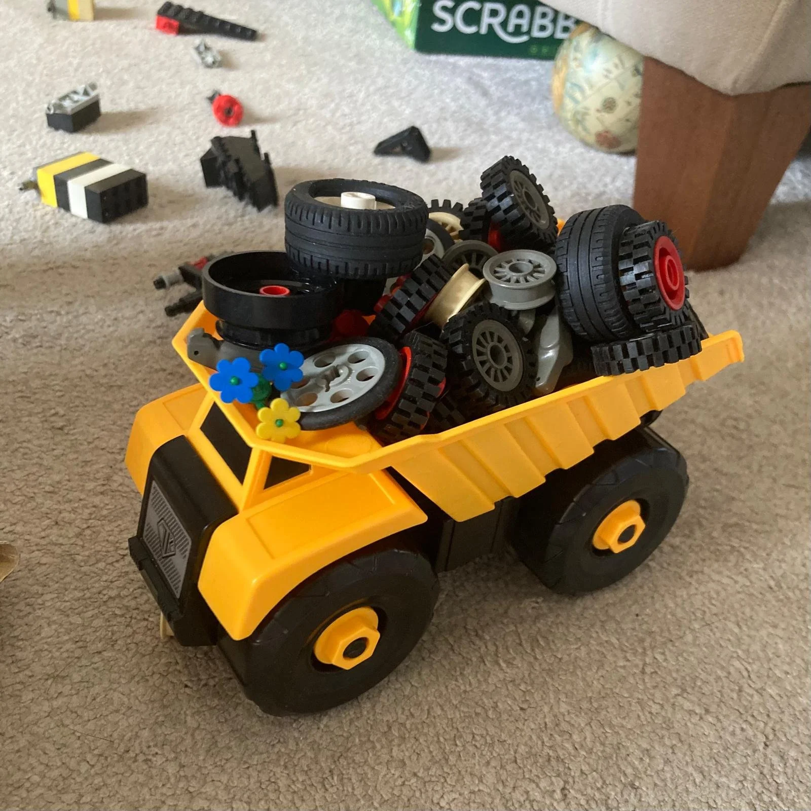 Toy yellow dumper truck