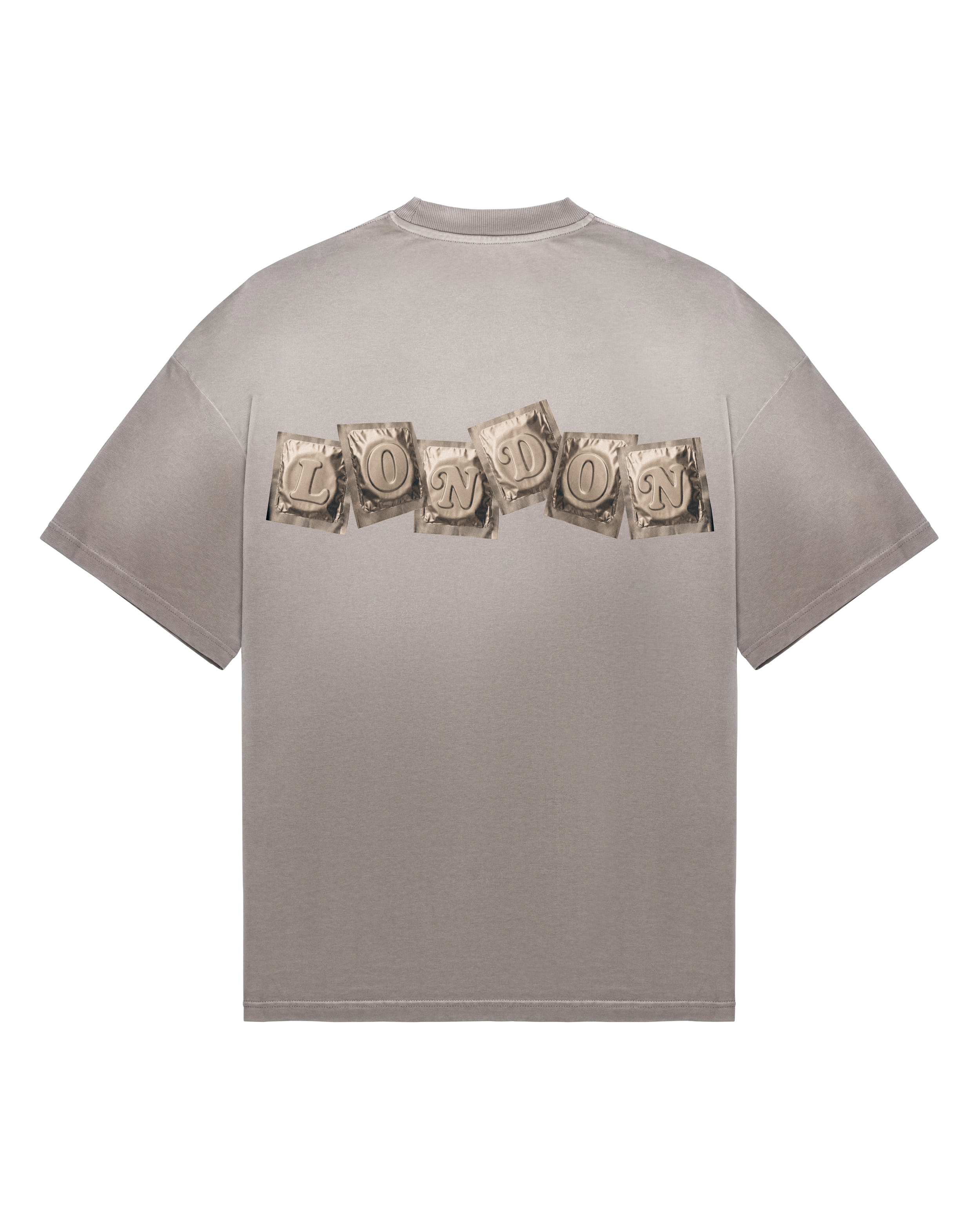 Back of a faded taupe oversized t-shirt, with five gold foil packets in a staggered line across the upper back spelling LONDON.