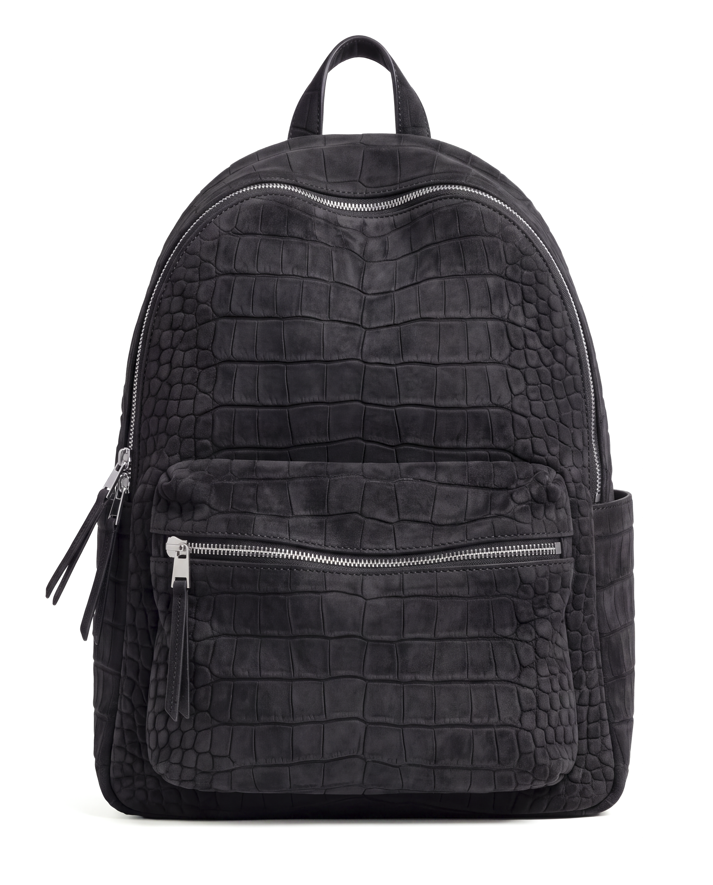 Black backpack with crocodile-textured pattern and silver zipper details, isolated on white background.