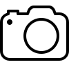 A black icon of a camera with a large lens in the center, representing photography equipment