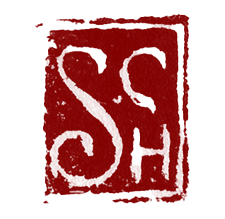A red seal or stamp with intricate Asian calligraphy or characters.