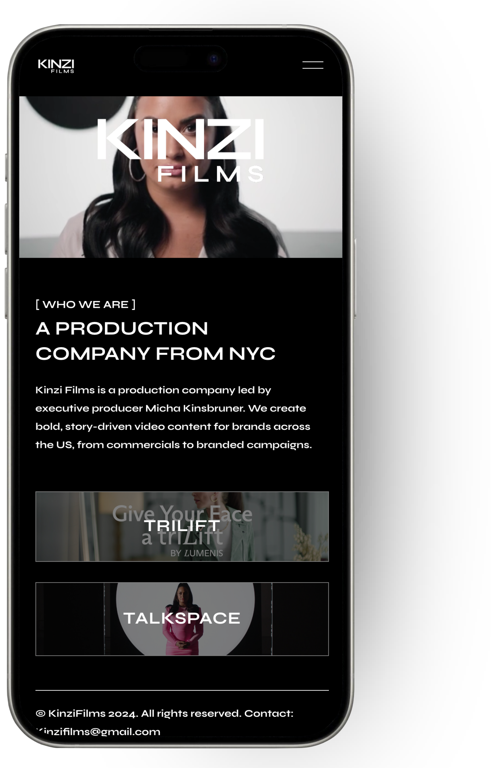 Mobile phone screen displaying the Kinzi Films website, featuring a woman with long dark hair, the Kinzi Films logo, and sections titled 'Who We Are', 'A Production Company from NYC', 'Give Your Face a TRILIFT', and 'Talkspace'.