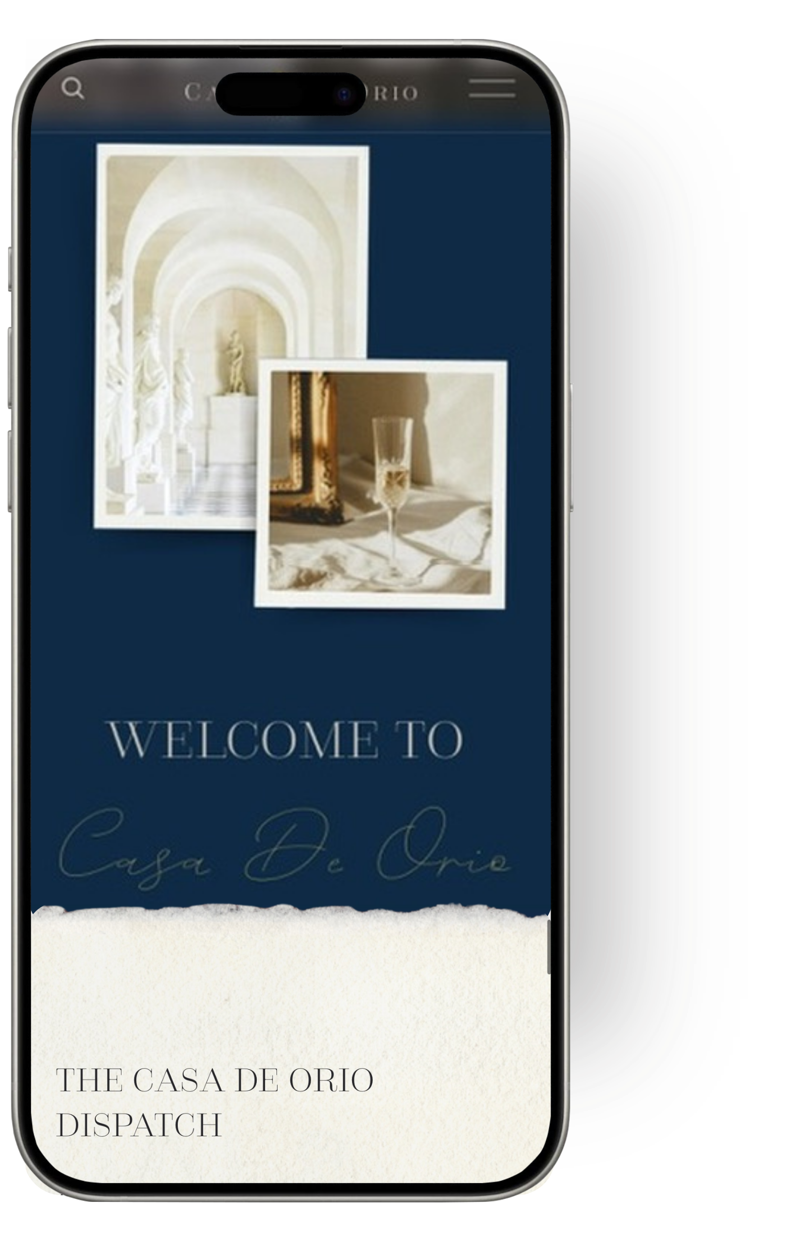 A smartphone displaying a website for Casa De Orio with images of classical architecture and a glass of champagne, welcoming visitors.
