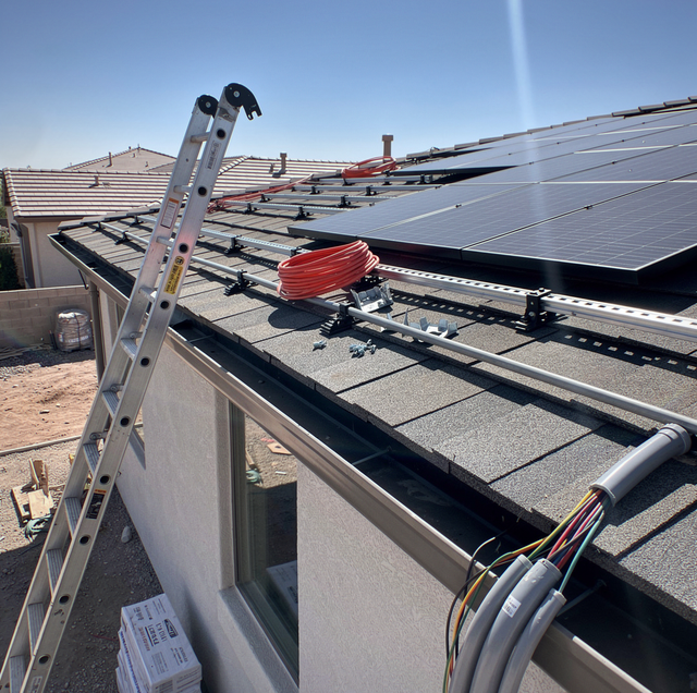 electrician wiring commercial building panel in Phoenix