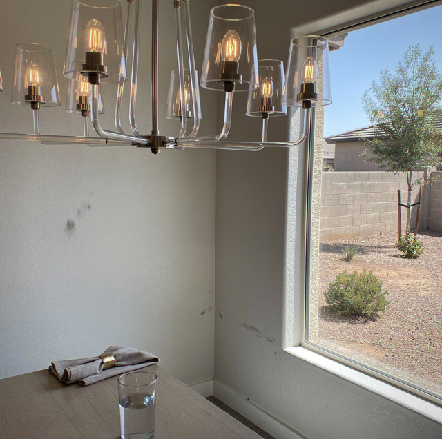 Modern LED retrofit bulbs glowing in vintage ceiling fixture
