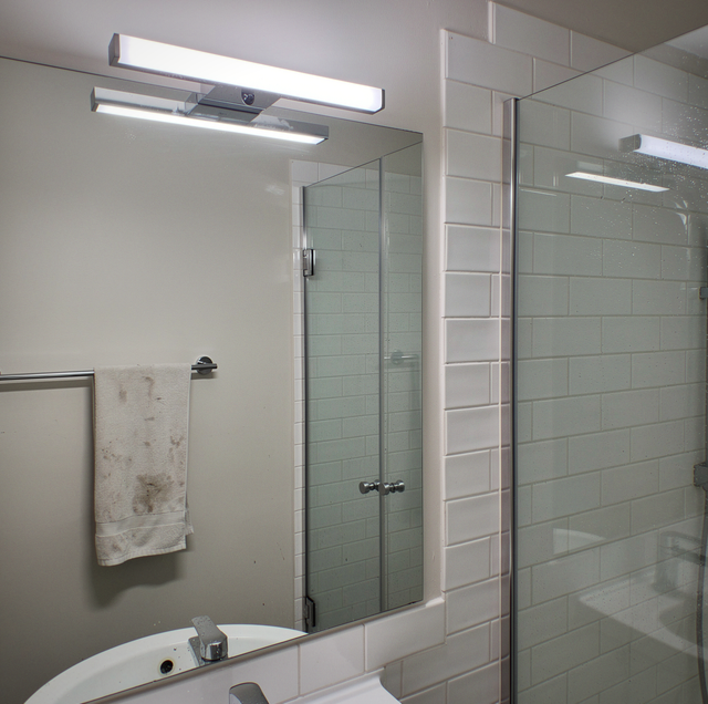 modern hallway lit by motion sensor ceiling light