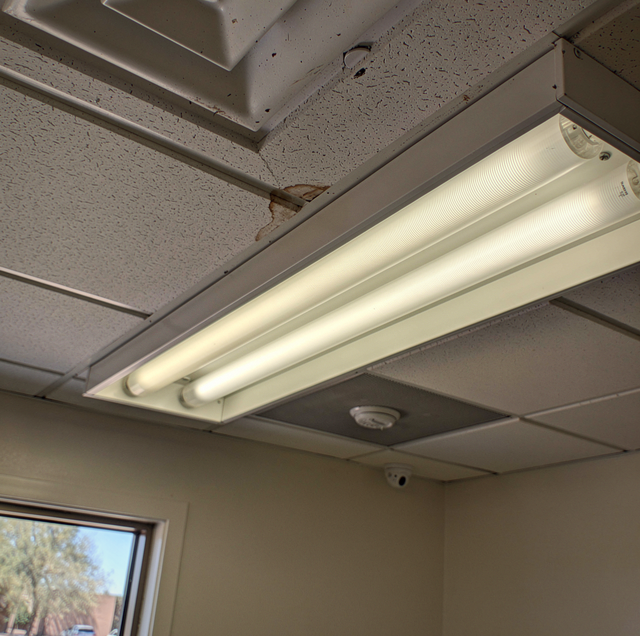 flickering fluorescent tube light in office ceiling fixture