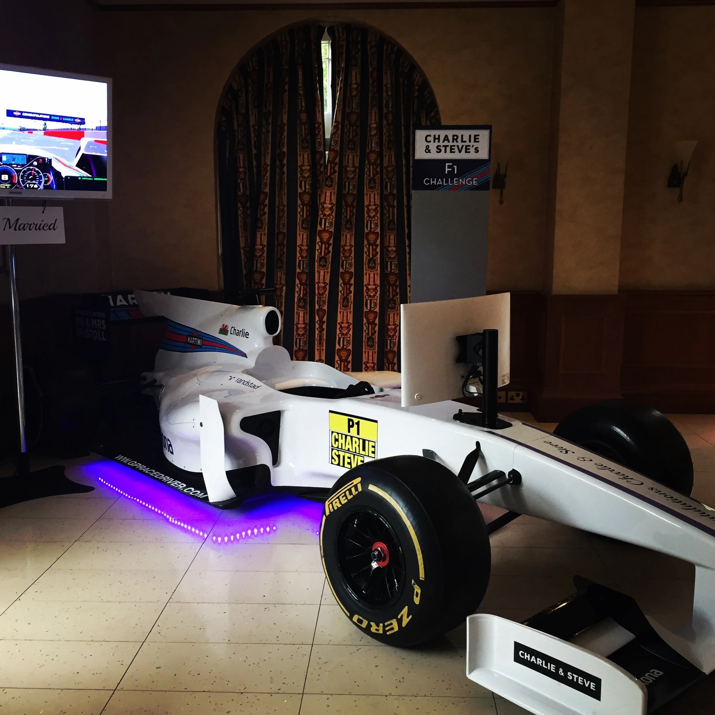 A Formula Party simulator at a wedding, with bespoke branding from our Qualifying Package. Featuring a Top Gear Leaderboard