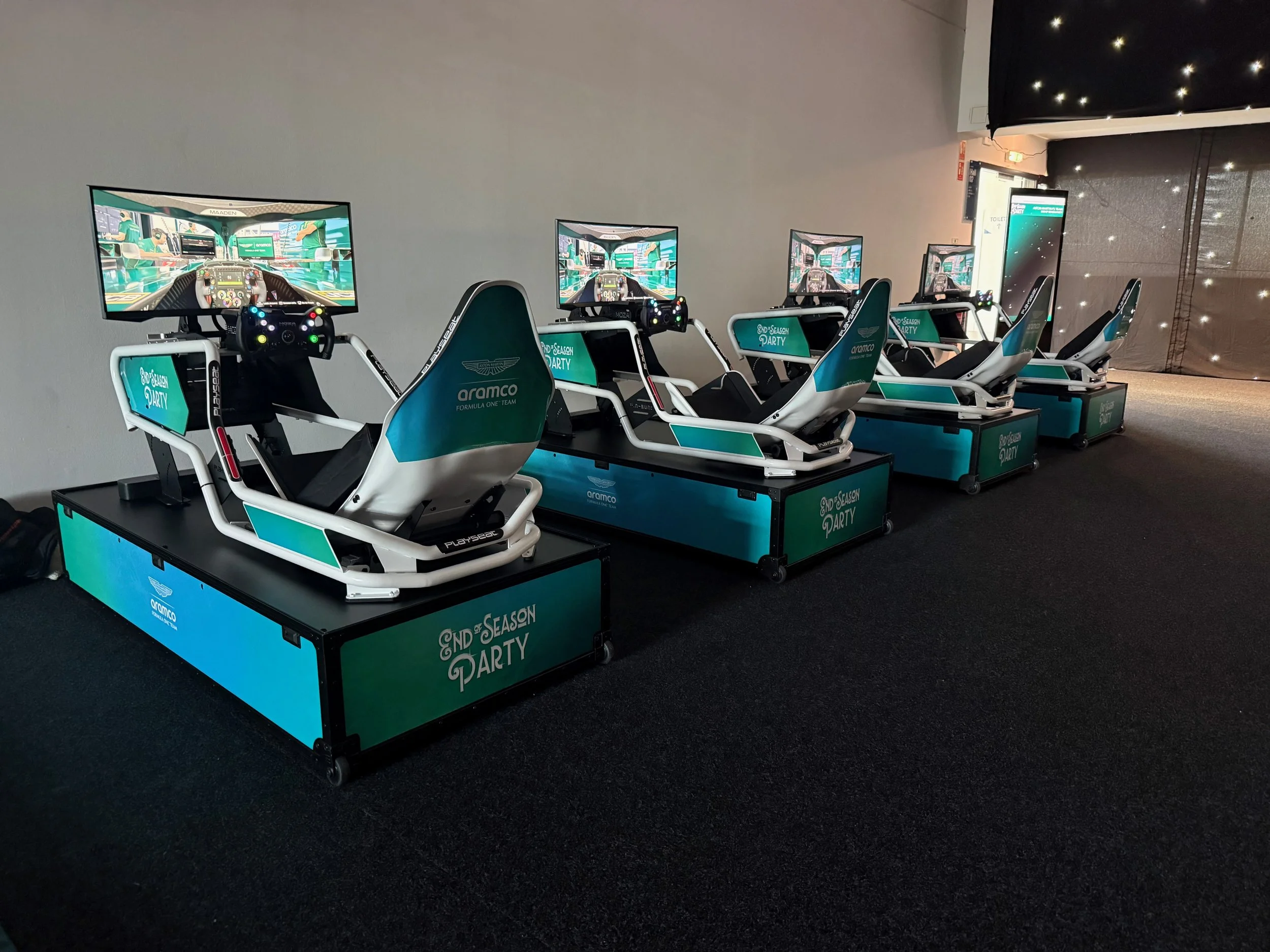 Four Formula Fun simulators with Race Day Package branding. Supplied for Aston Martin F1 Team at Silverstone circuit.