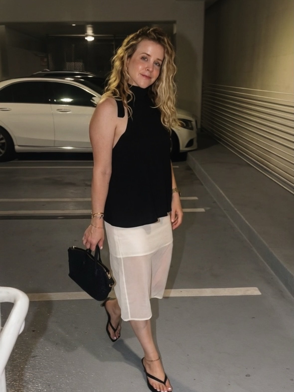 Been wearing and re-wearing this sheer skirt a bunch this summer. Pro tip: I added a nude tube top as my base layer to add a bit more coverage while maintaining the skirt's effect. I always appreciate making trends feel more "me". How would