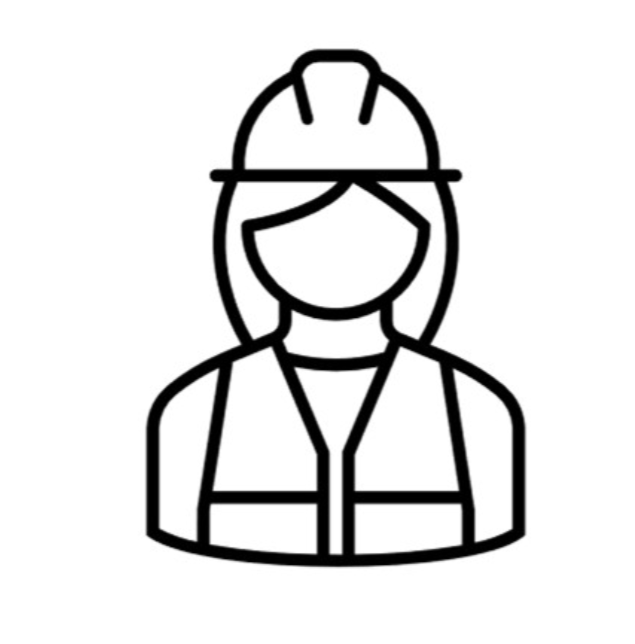 A woman wearing a construction helmet and safety vest outdoors