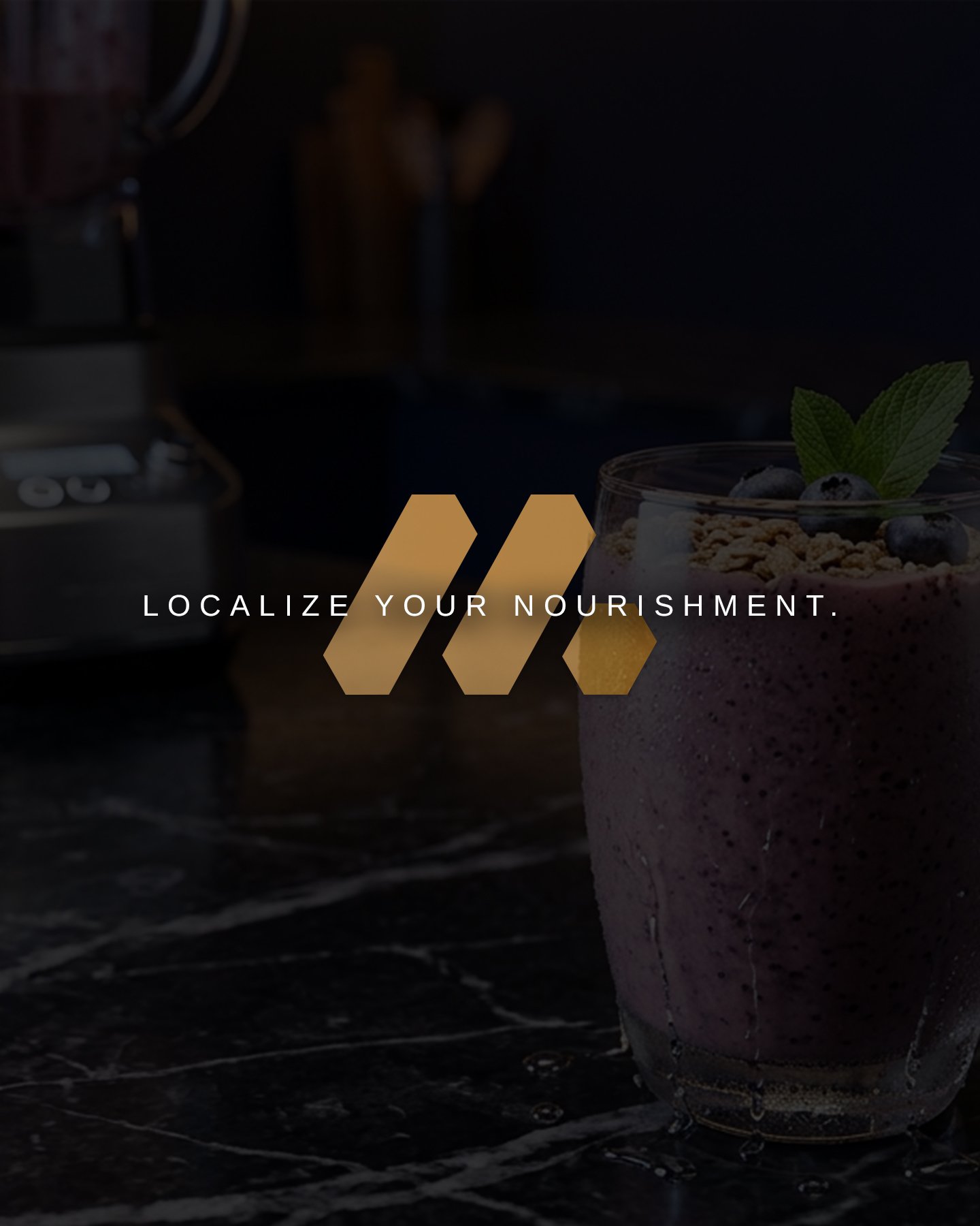 A purple smoothie garnished with blueberries, mint leaves, and granola in a glass on a dark table with a blurred coffee machine in the background and a motivational overlay stating 'Localize Your Nourishment'.