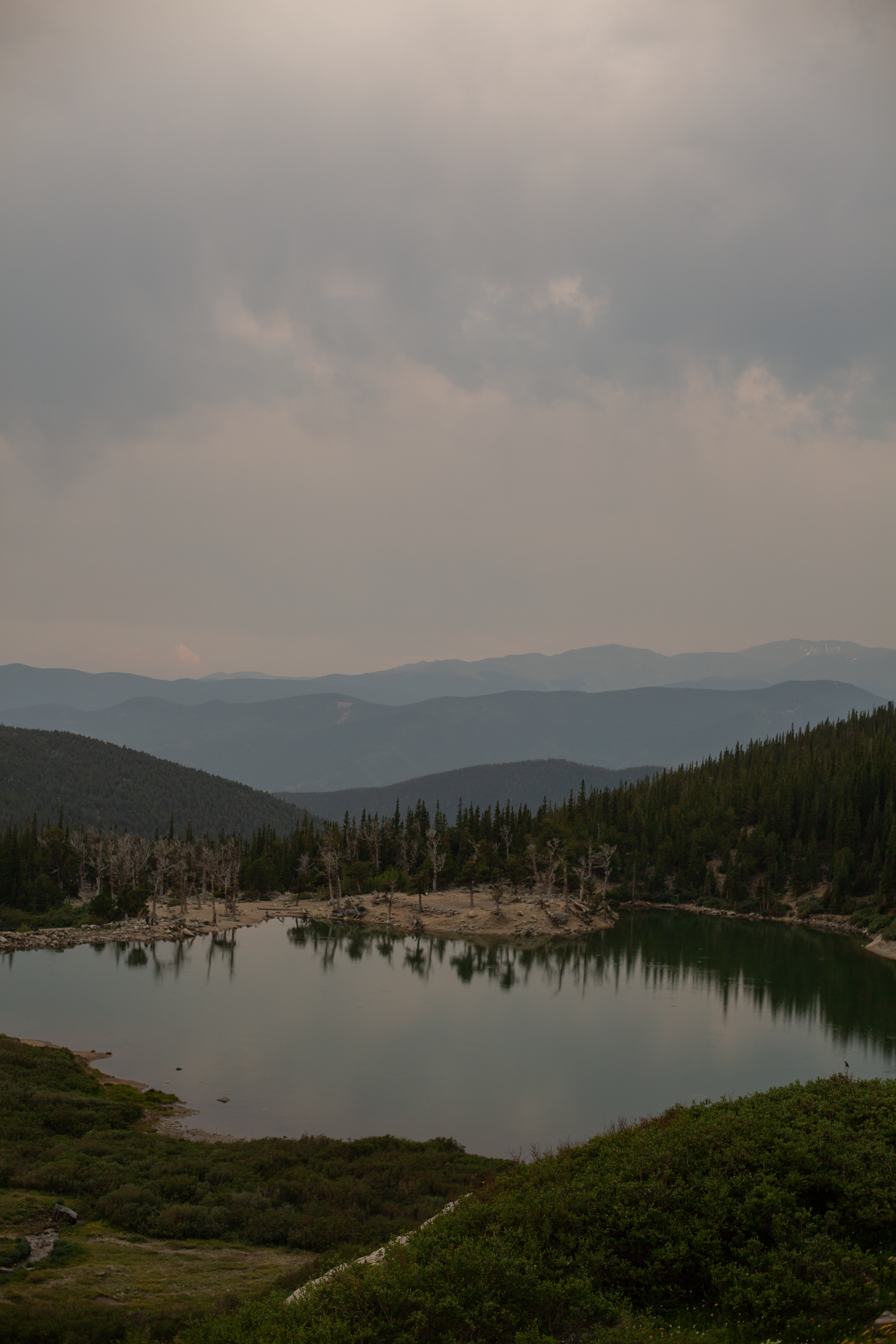 Mountains, lake, campground, warm sunny days near Rocky Mountains, Colorado.