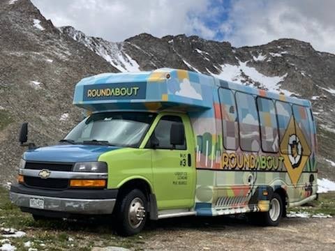 Taking a bus in the mountains in the Rocky Mountains, Colorado.