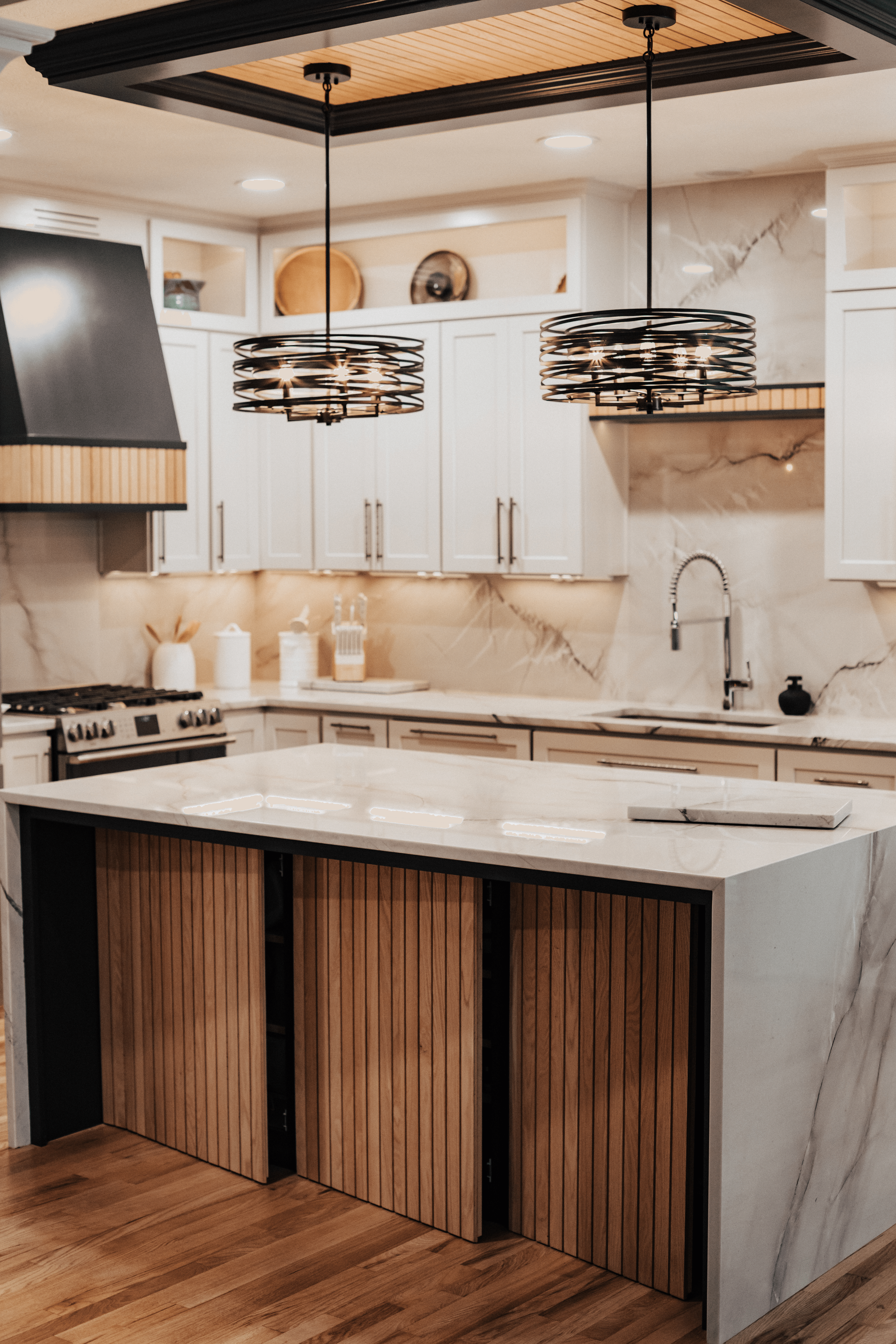 modern kitchen in dublin with textured countertop with decorations like a sink, lights, and knife holders.