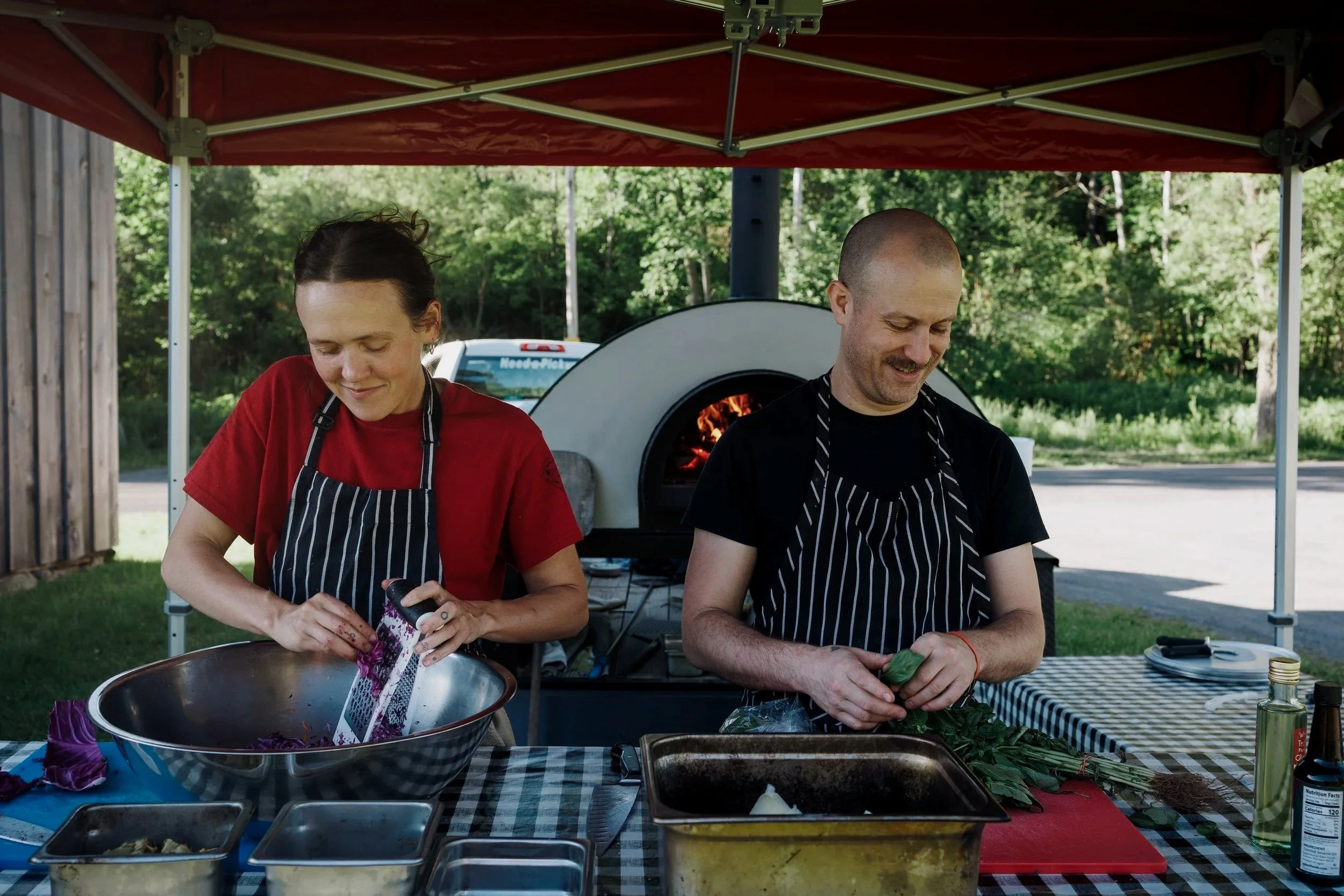 two private chefs from our wood fired pizza staff prep before event, pizza truck south florida
