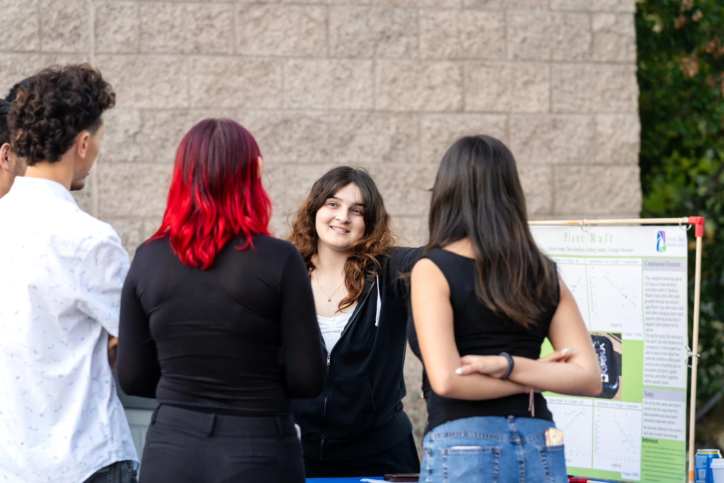 image of student presenting poster 