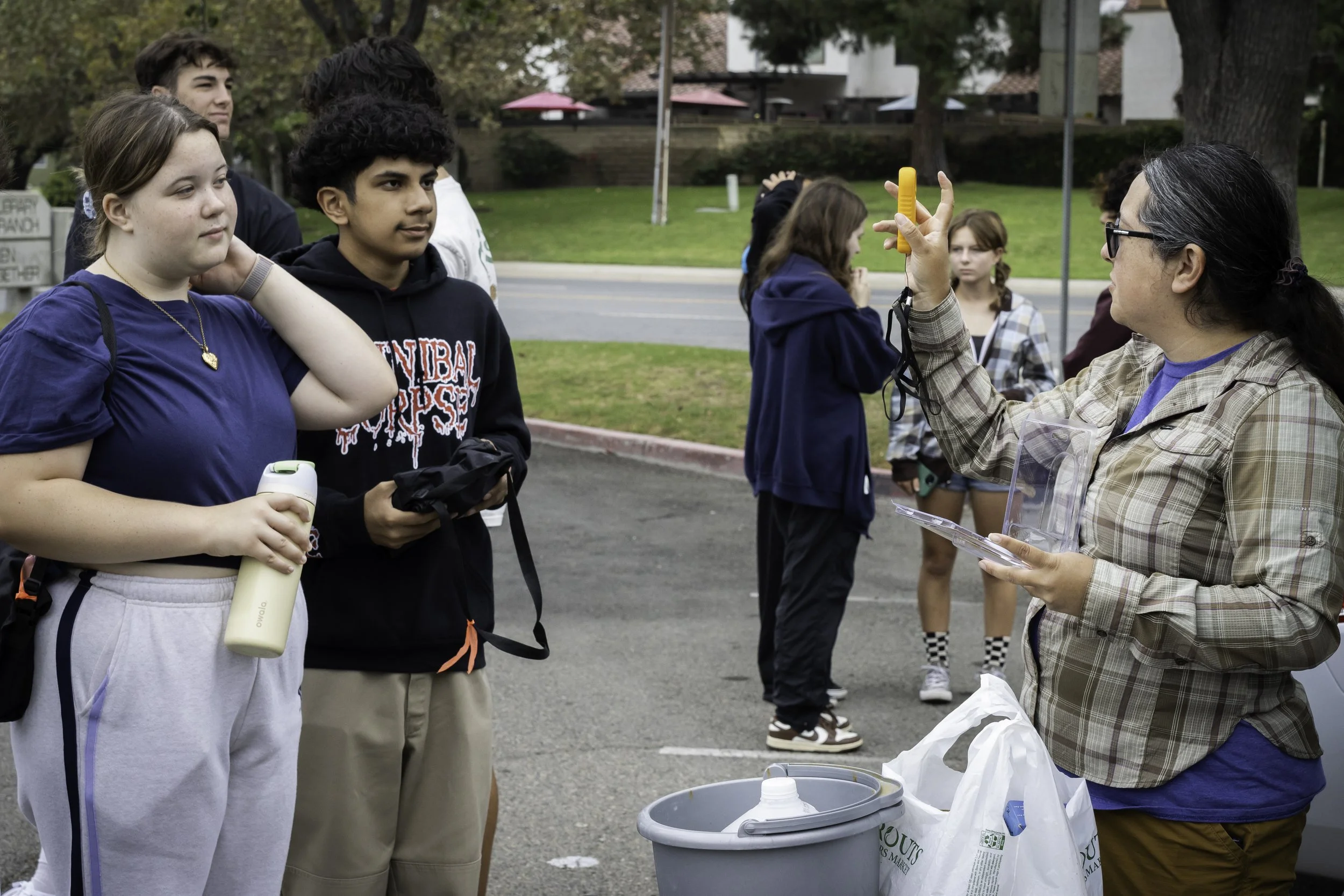 image of two students watching a demonstration