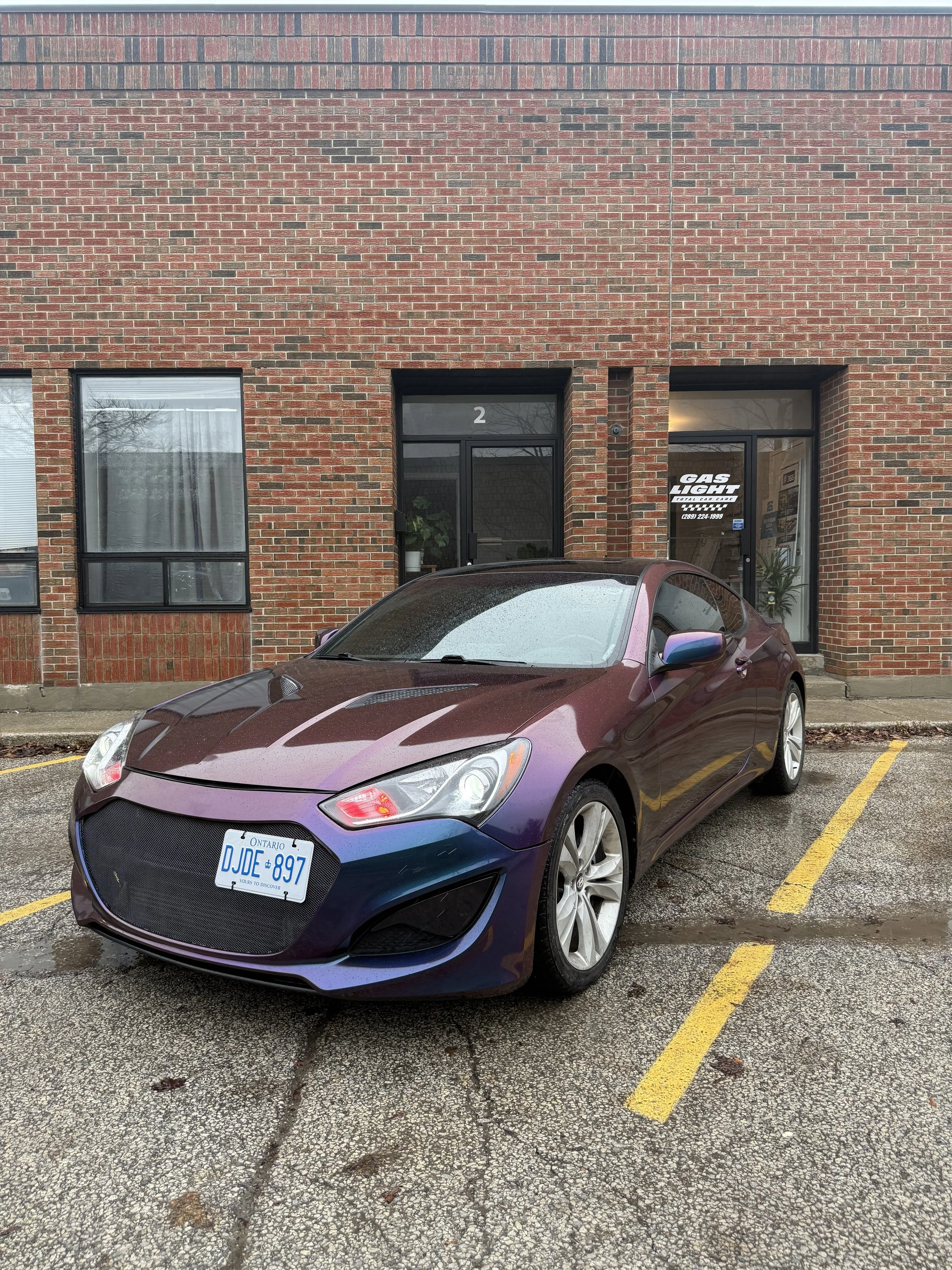 Purple colour-shifting Hyundai Genesis Coupe outside the studio