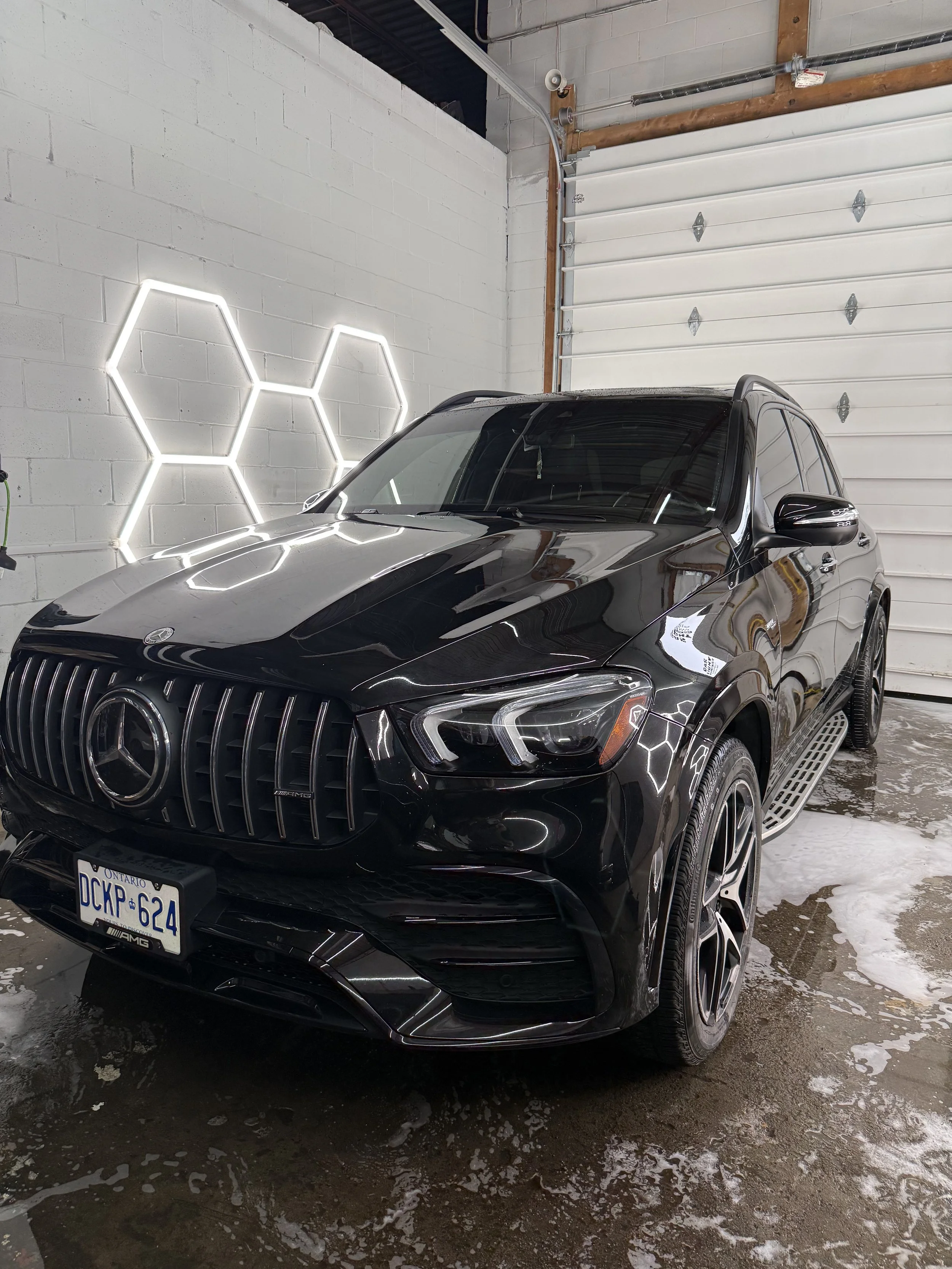 Black Mercedes-AMG SUV after detailing inside the studio