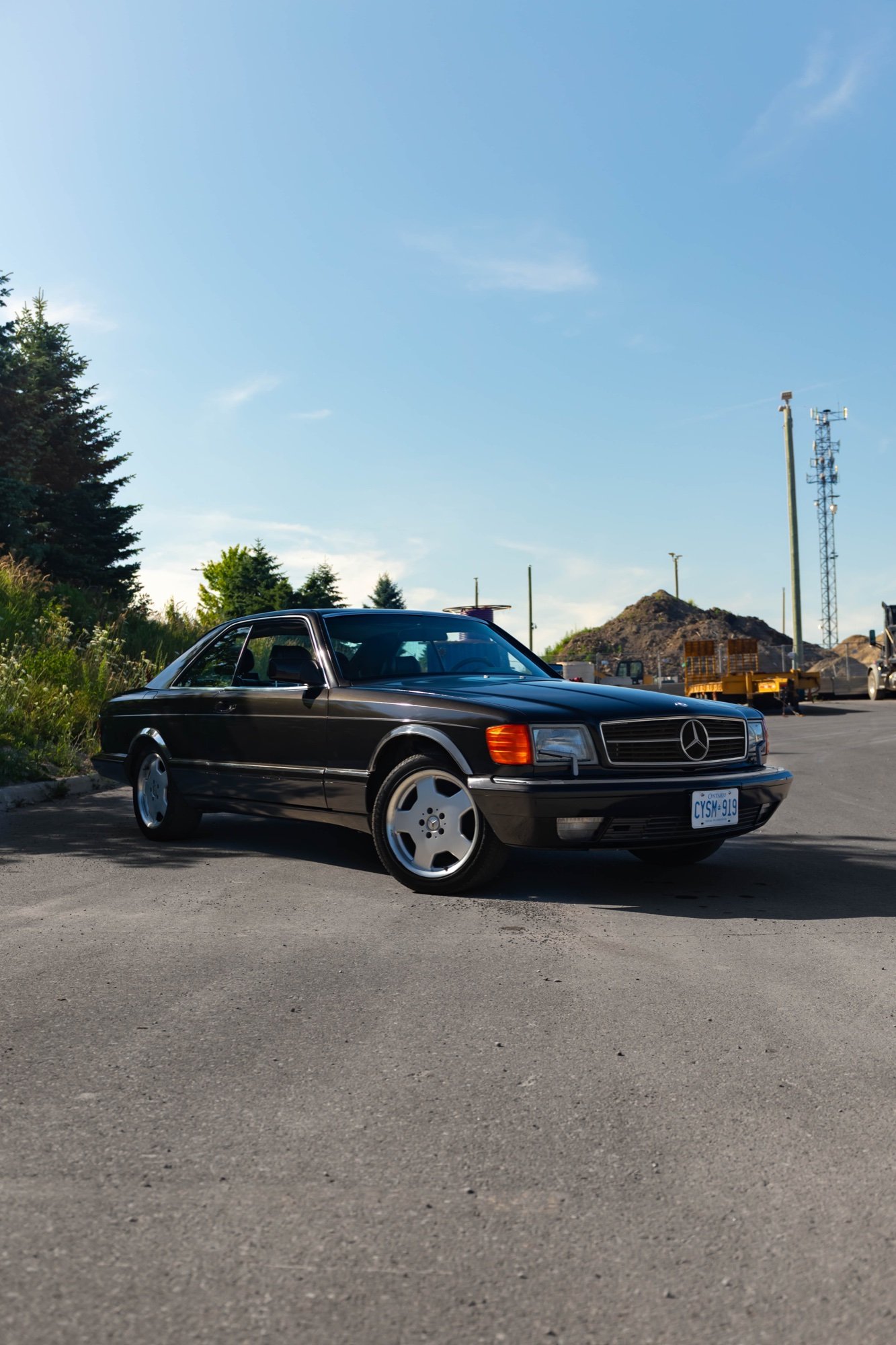 Classic black Mercedes-Benz coupe photographed outdoors