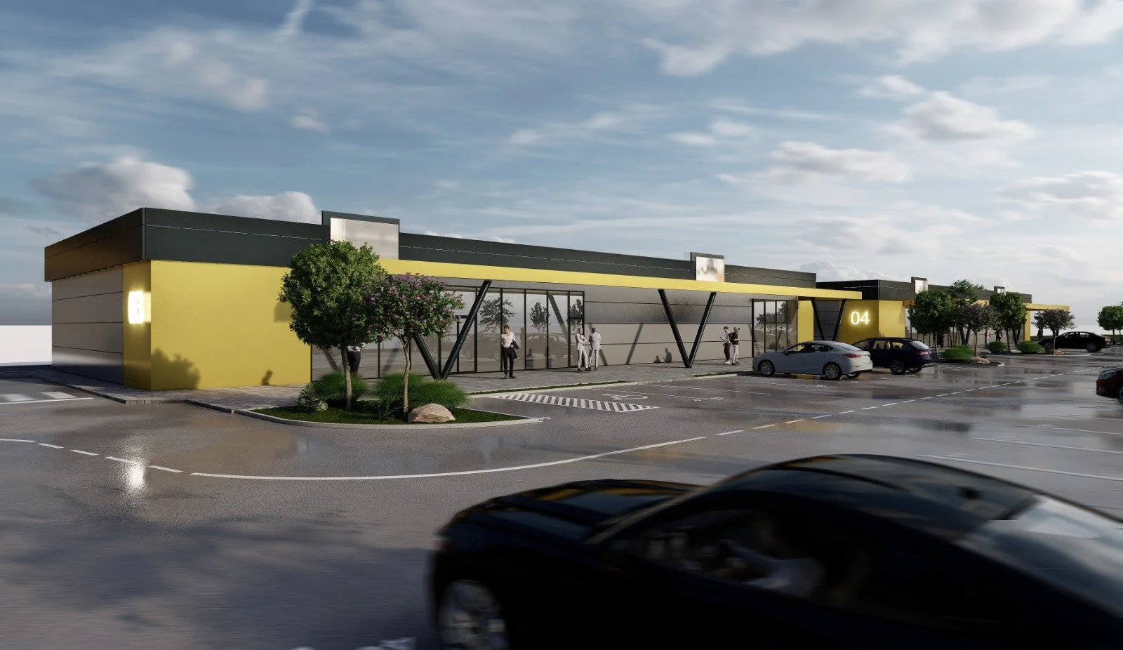 Rendering of a modern, single-story commercial building with yellow and gray exterior, large glass windows, and an entrance with black angular support beams. There are cars parked in nearby parking spots and a few people walking outside. Trees and la