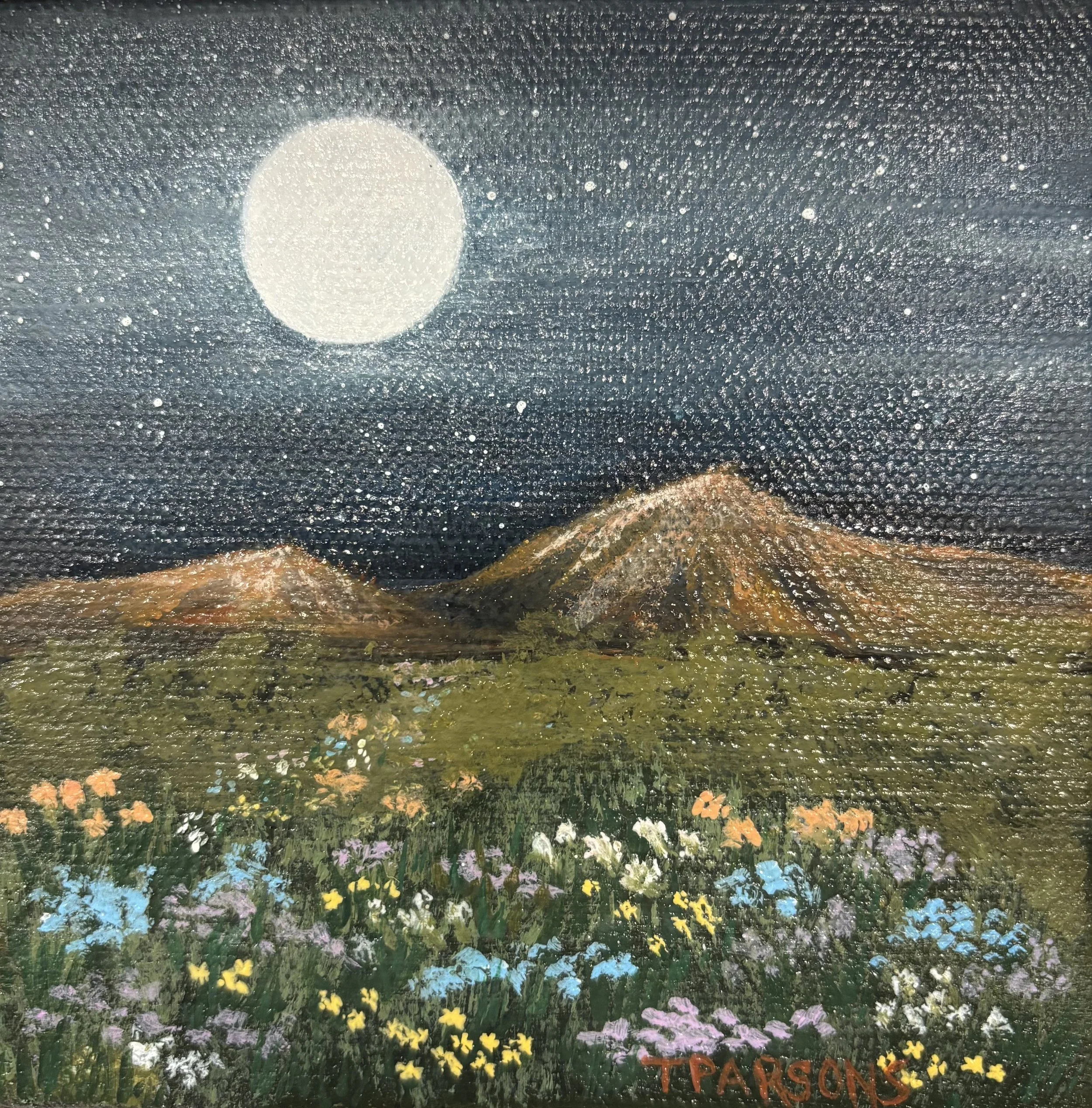 Colorful landscape painting titled "Moon Blossoms," a lush garden with vibrant flowers in shades of yellow, purple, blue, and white, featuring a river or pond surrounded by greenery under a blue sky. The painting is signed in the bottom right corner