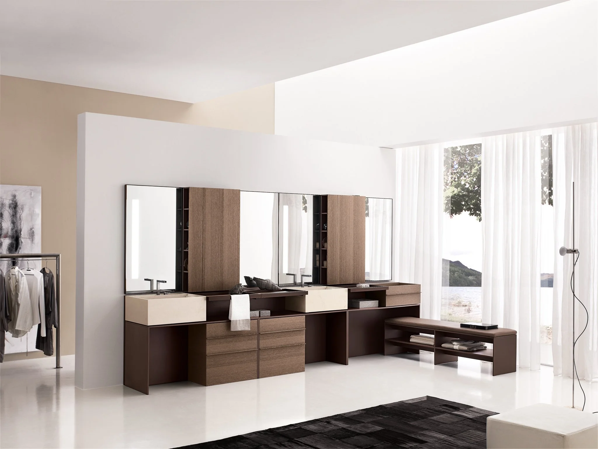 Modern interior with built-in wooden storage units, large windows with white curtains, and a black rug on a white floor.