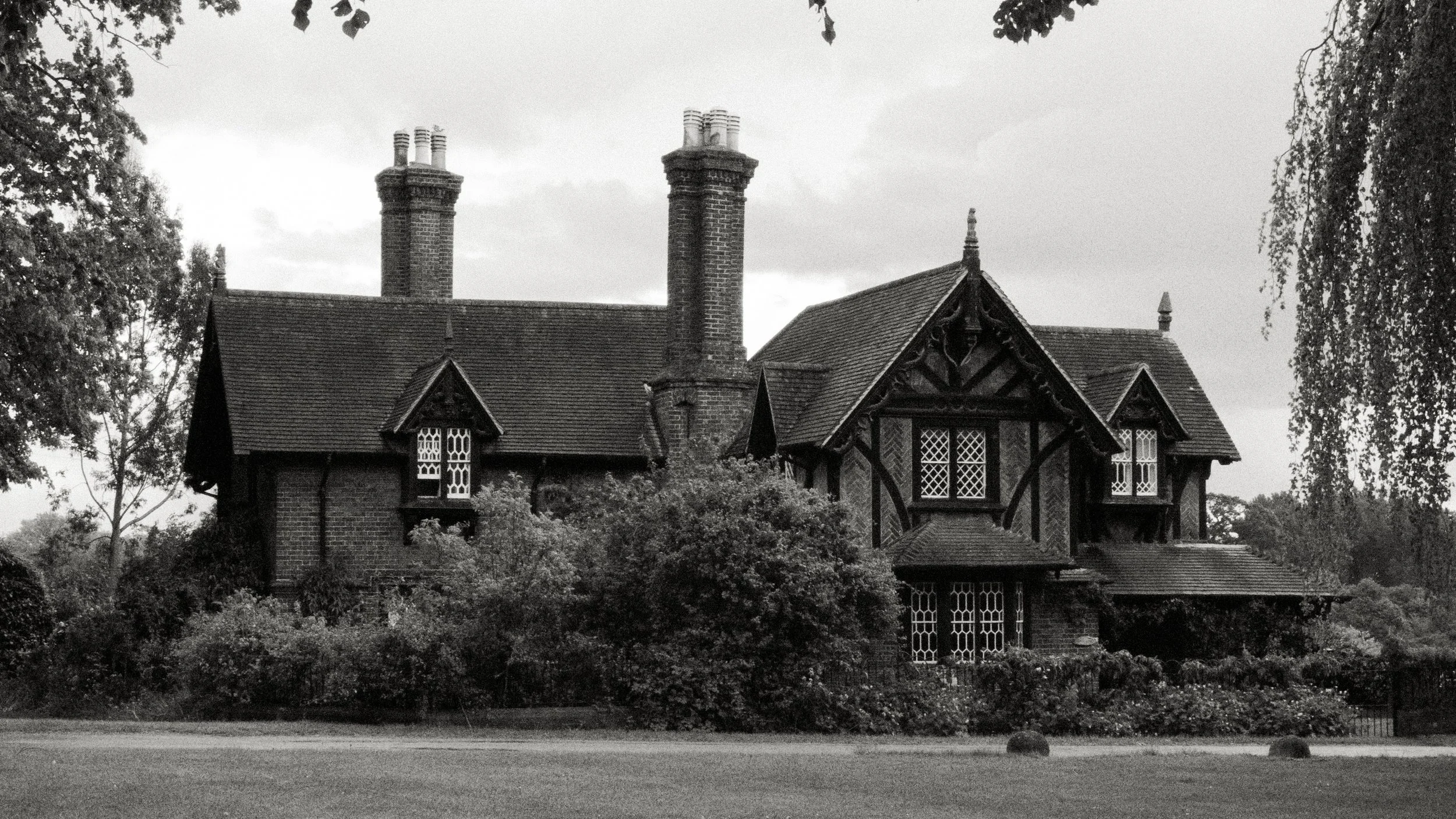 Exterior of a former Royal Kennel built in the 1840s for Queen Victoria's beloved dogs on the private grounds of Windsor Castle. At the time of this photograph, it was the home of Robert Lange, Yeoman of the Royal Cellars and Ice and Snow.
