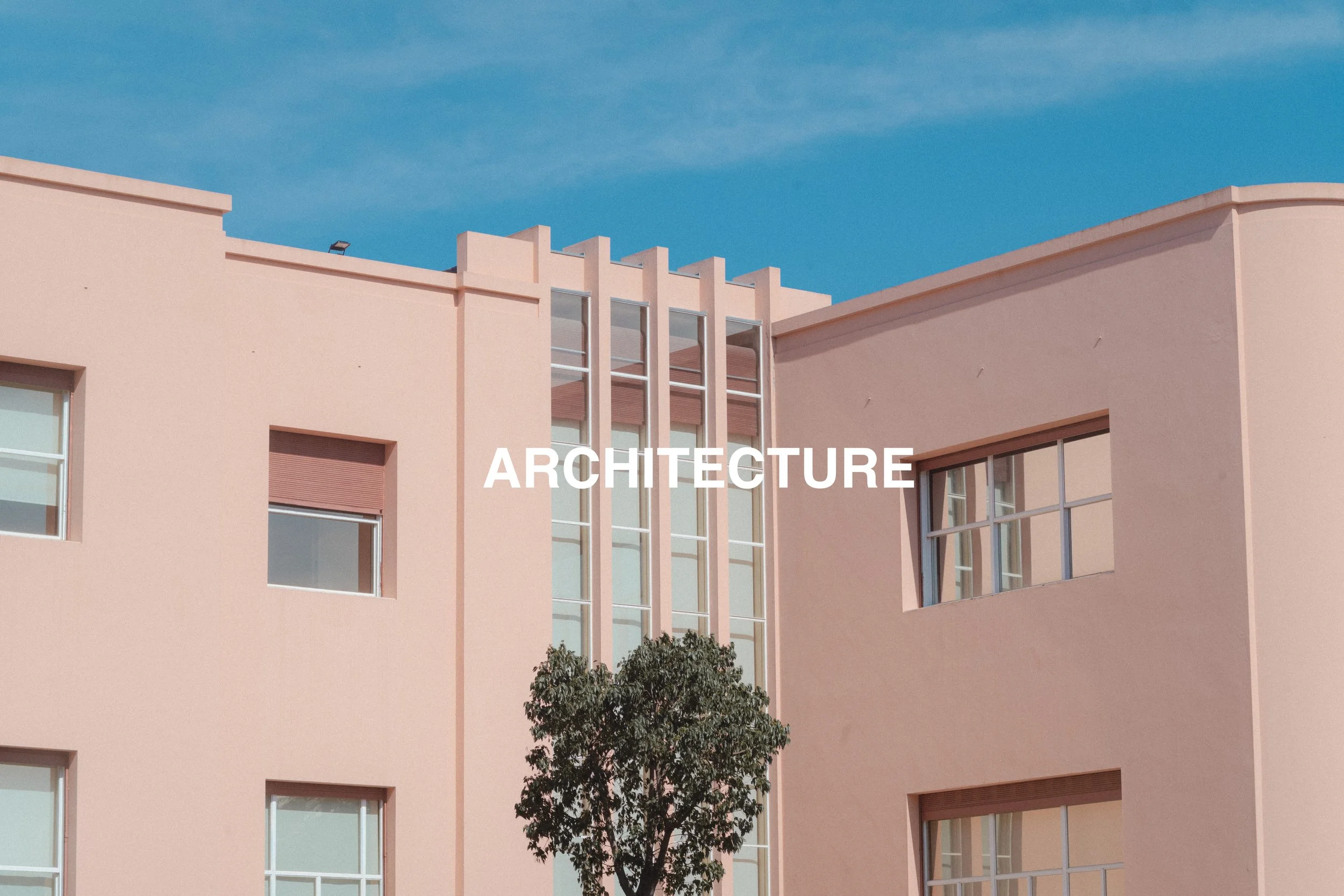 Modern pink building with large windows, a tree in front, and a blue sky background, with the word 'ARCHITECTURE' overlaid.