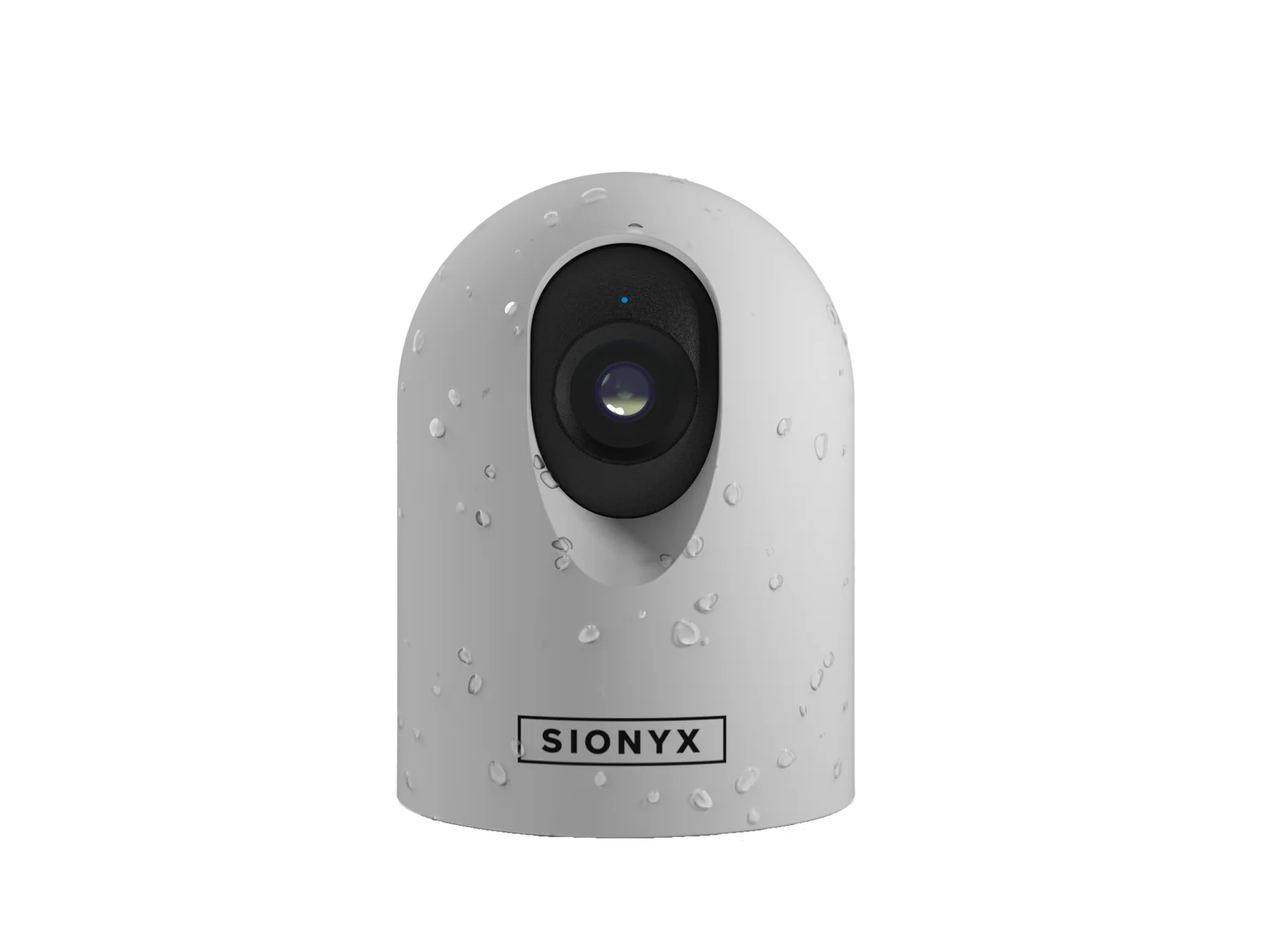 A white security camera with water droplets on its surface, labeled 'SIONYX'. The camera is positioned against a black background.