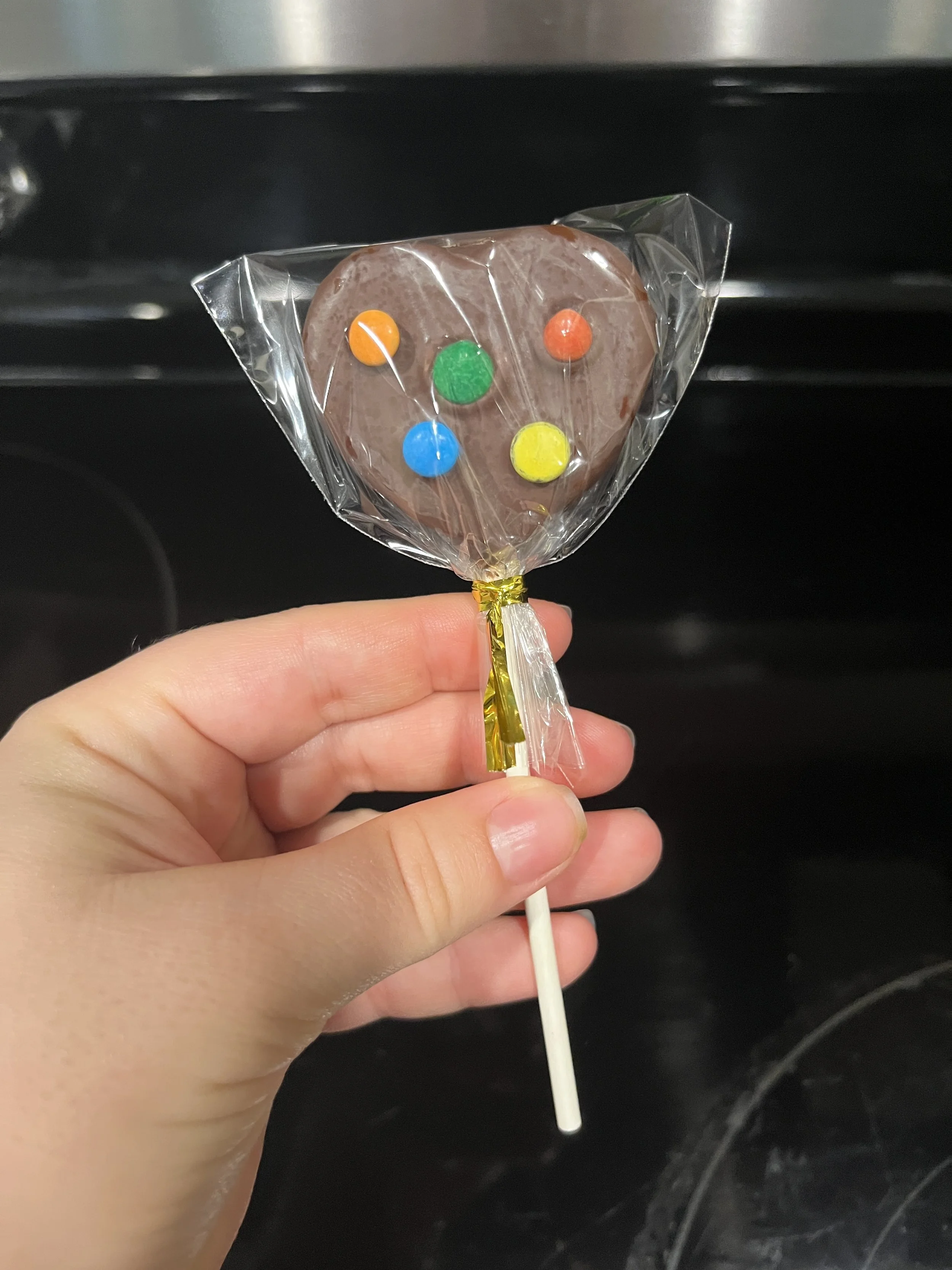 chocolate cosmic Cake Pop wrapped.JPG