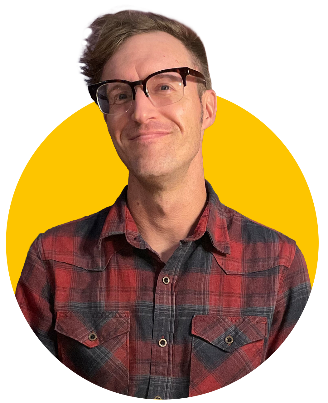 A smiling man with glasses and wearing a red and black plaid shirt standing against a colorful background.
