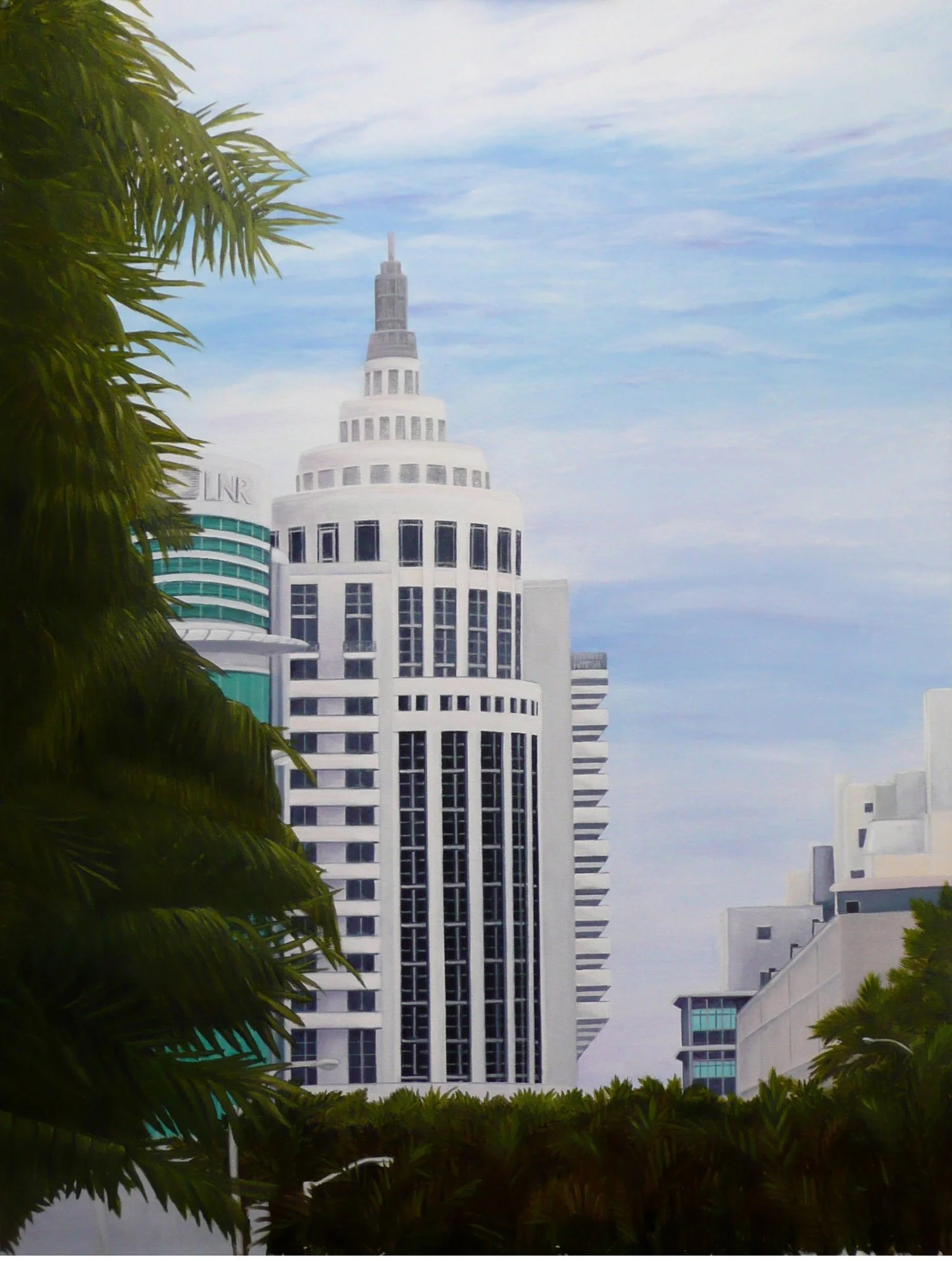 Tall white modern building with curved and rectangular windows, set against a cloudy sky, with palm trees in the foreground.