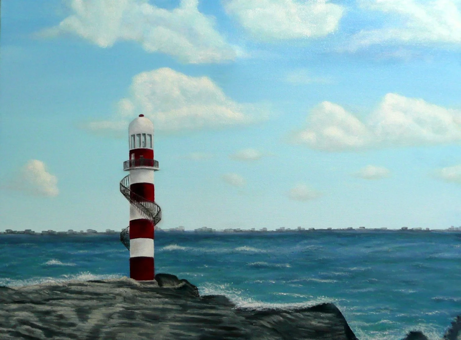 A lighthouse with red and white stripes stands on rocks by the ocean, with a partly cloudy blue sky and a distant shoreline in the background.