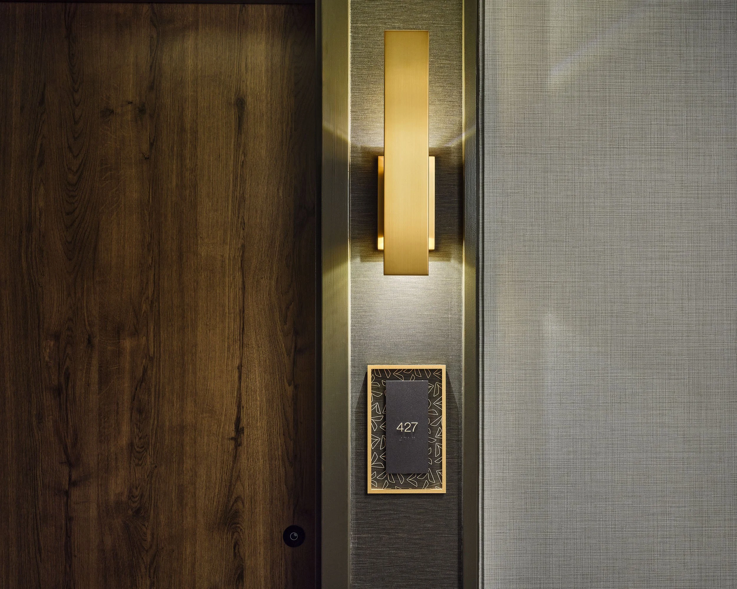 ApiaryHotel-PublicSpace-Hallway-DoorSign.jpg