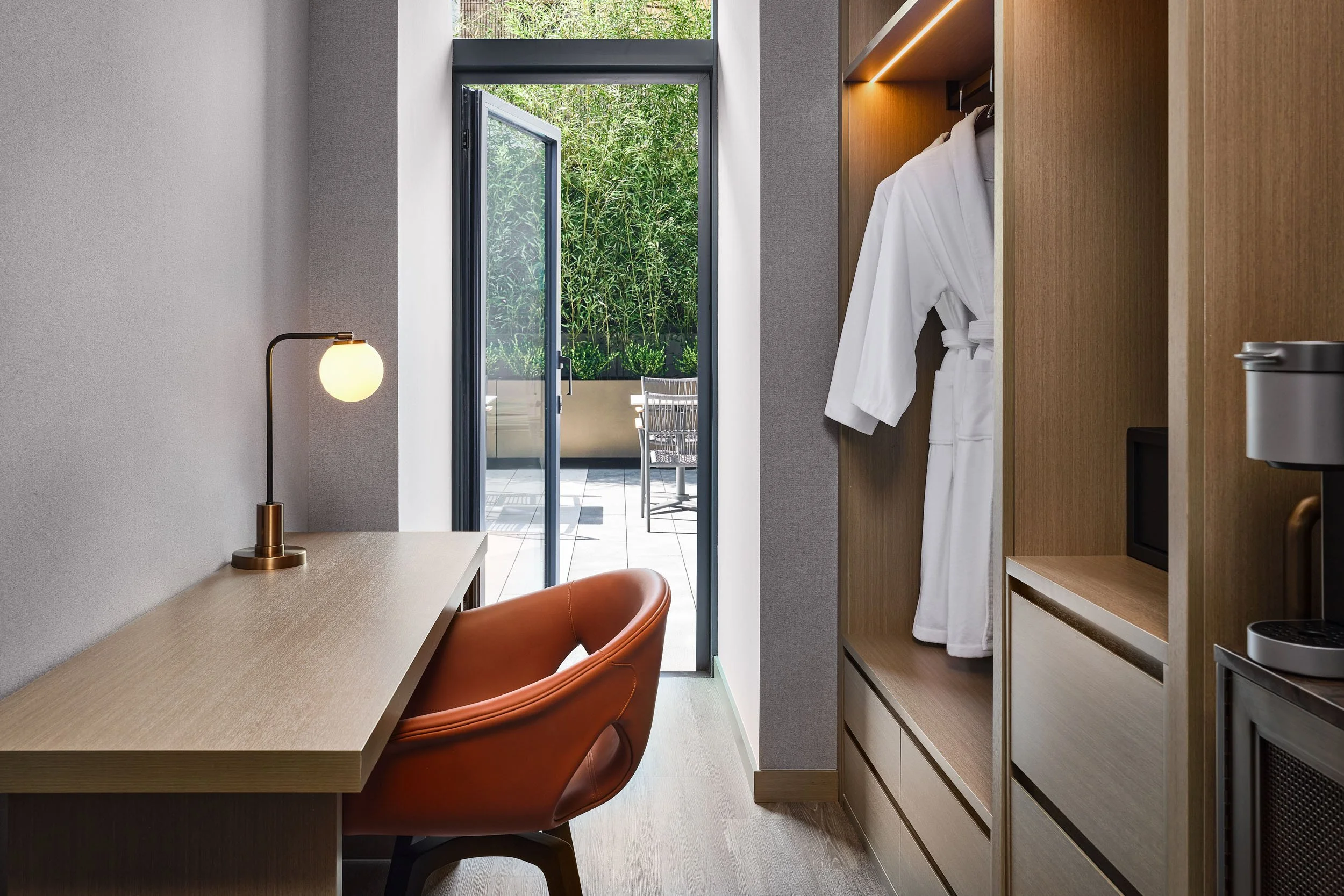 NYC-TheGeorge-Tapestry-PatioRoom-DeskDoor.jpg