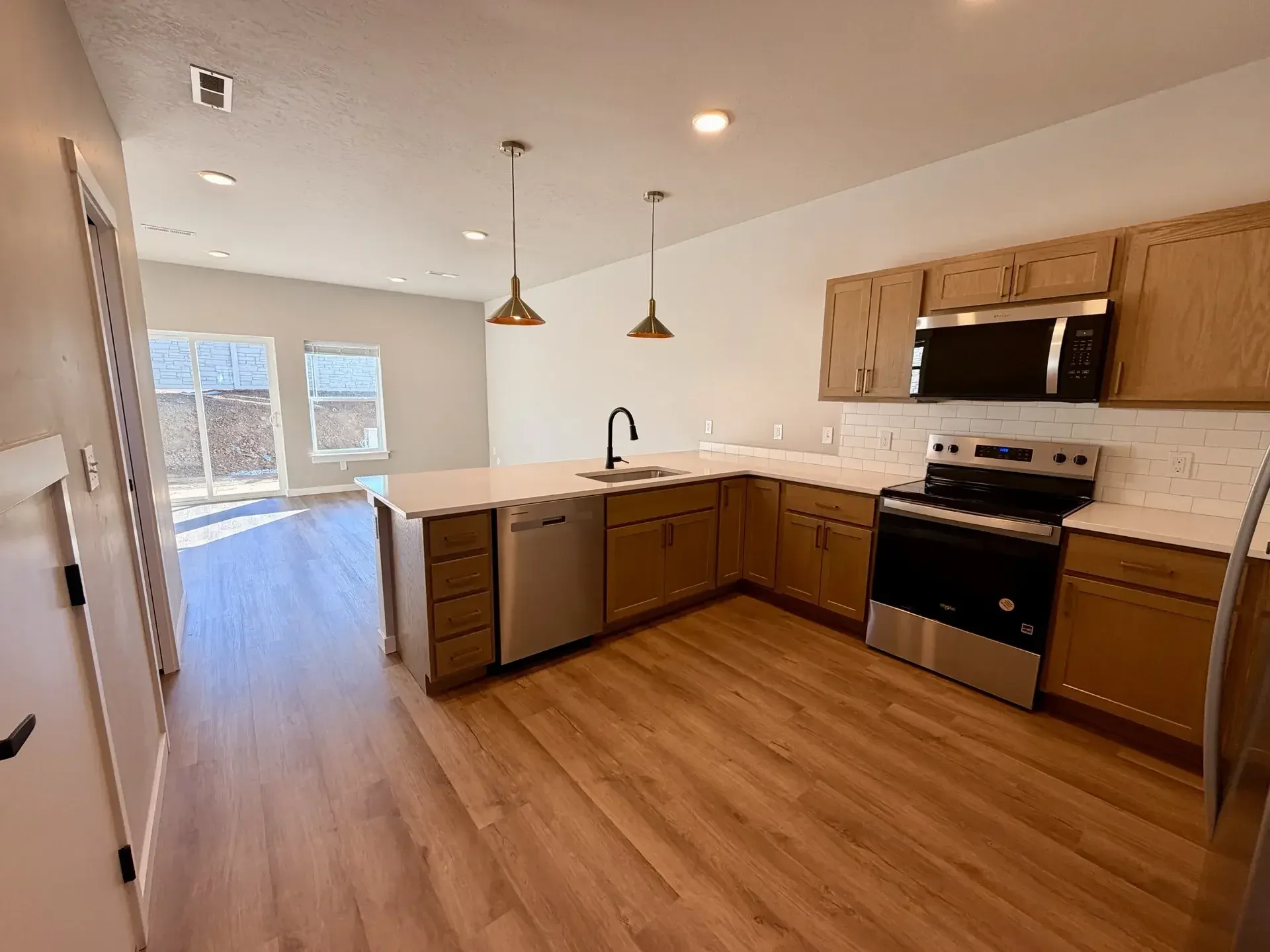 Interior of Eagle Villas luxury townhomes in Eagle, Idaho, with finish trim and door installation completed by West Construction Services. 