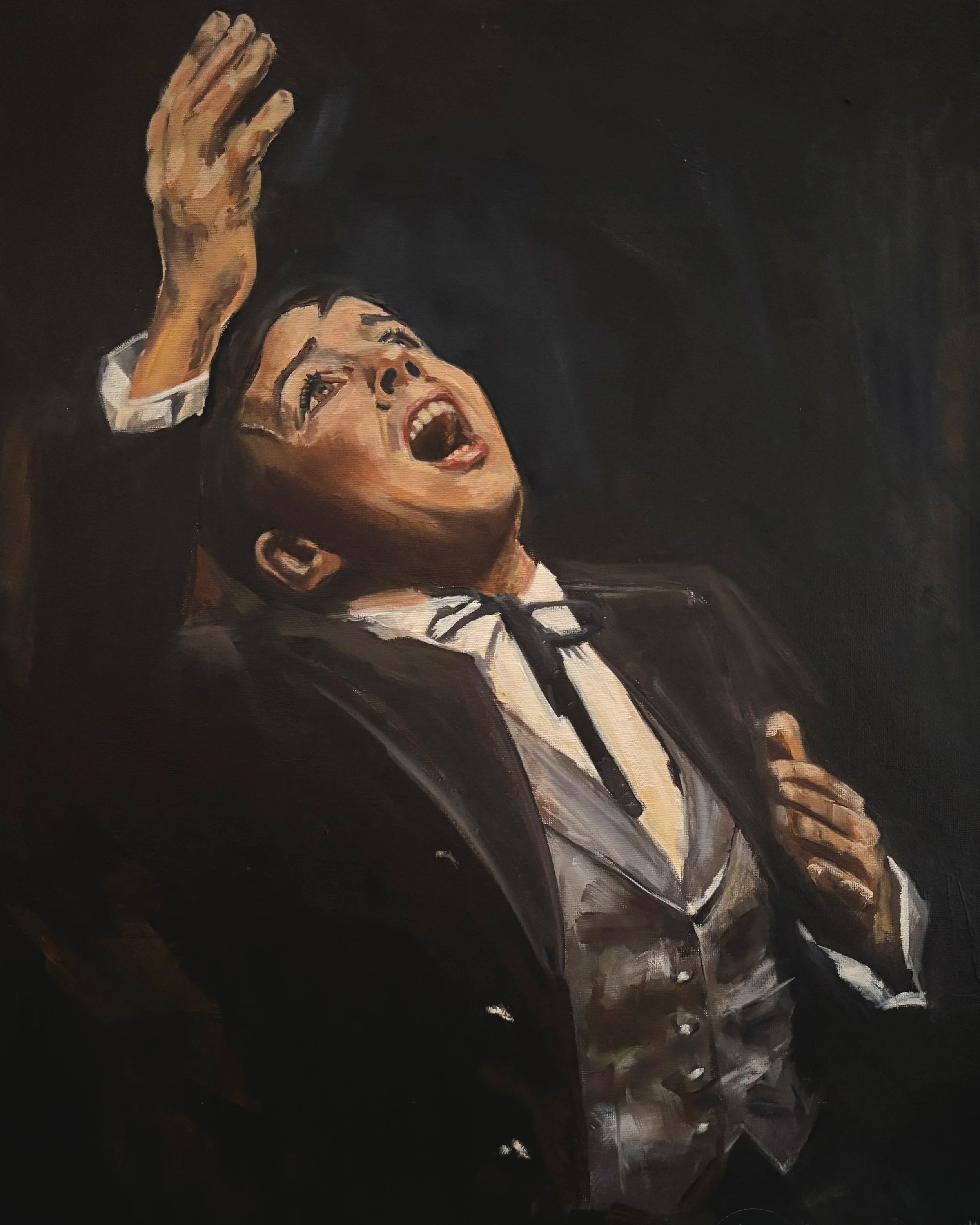 Painting of Lesley Mackie as Judy Garland, wearing a dark suit and silver waistcoat, looking upwards with mouth open and one hand raised.