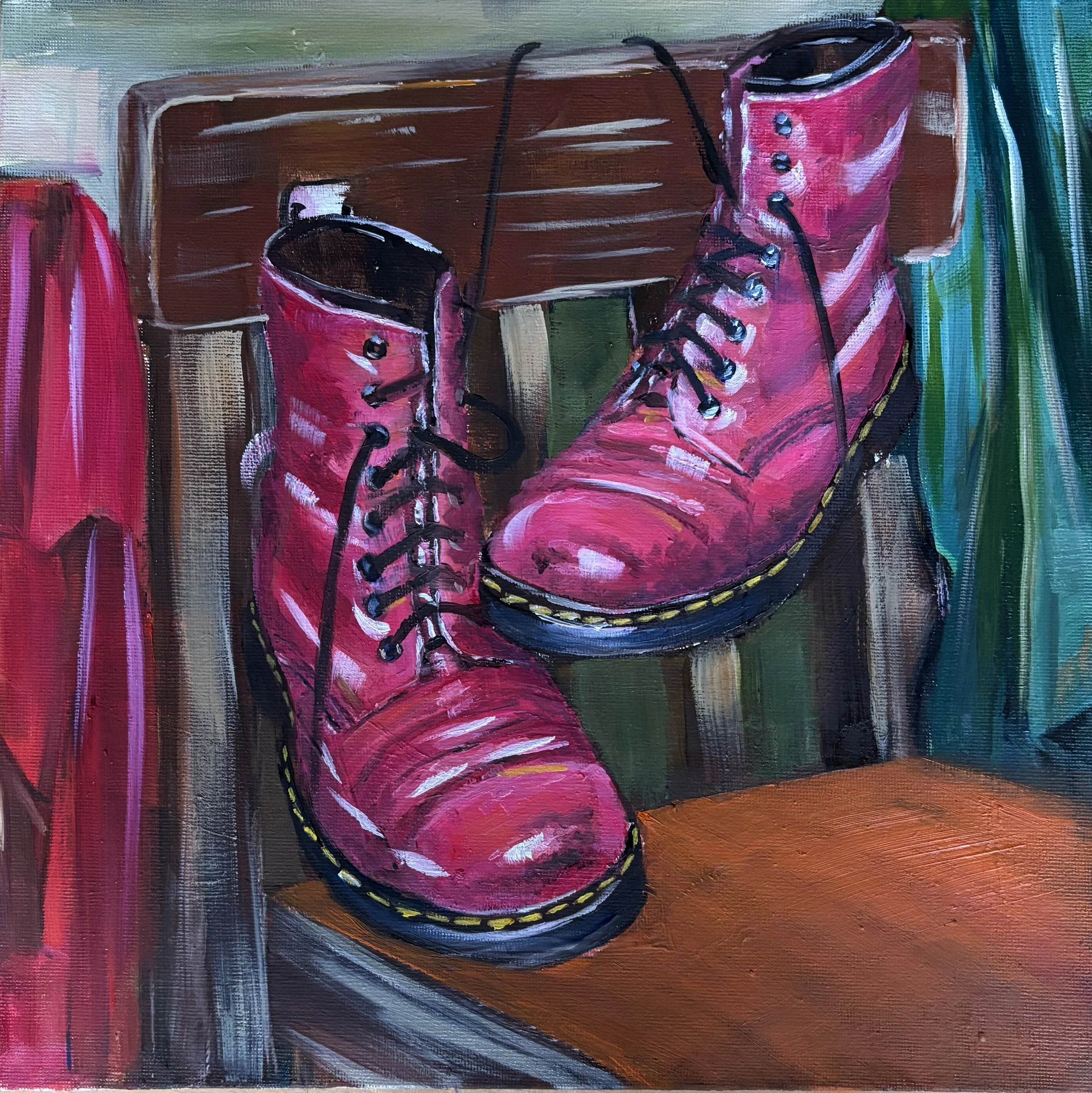 Painting of bright pink boots hanging by their black laces from a wooden chair, between red and turquoise costumes.