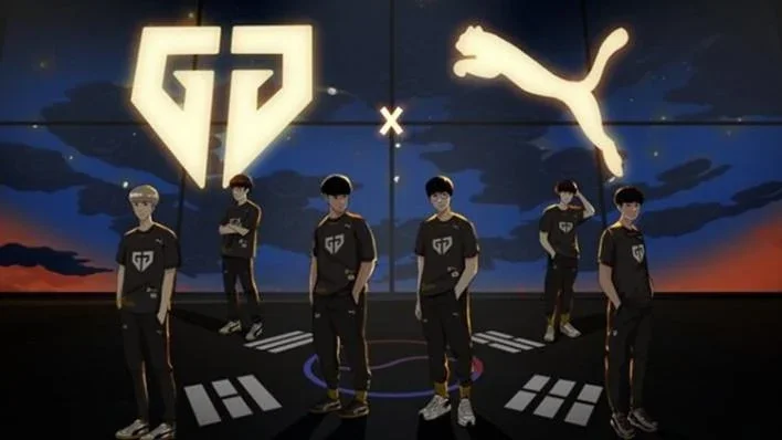 Five young men standing in front of a gaming backdrop with logos of G2 Esports and Puma, featuring a sunset sky background.