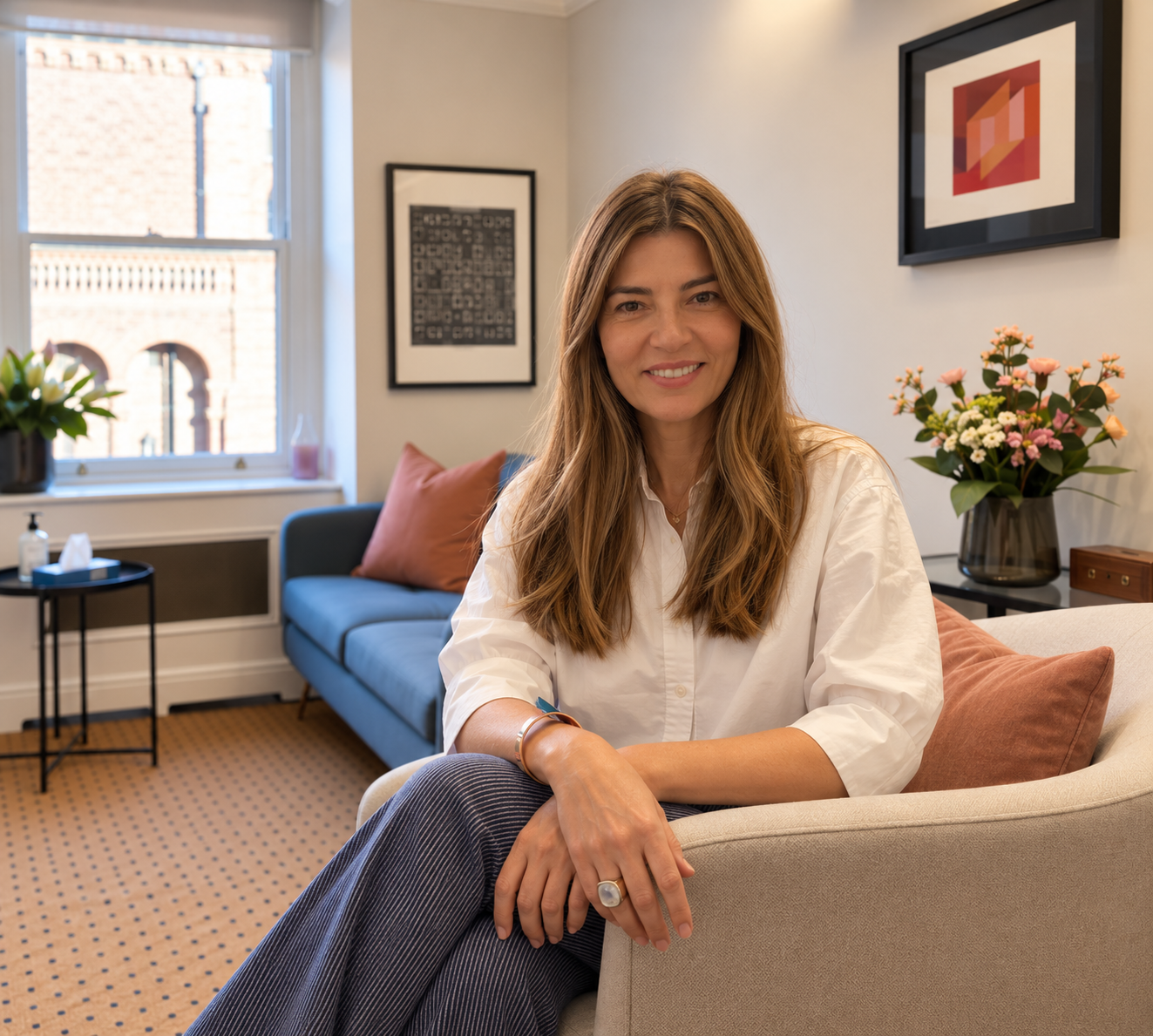 1. Dr Gisele Caseiras sitting in her therapy room in London.