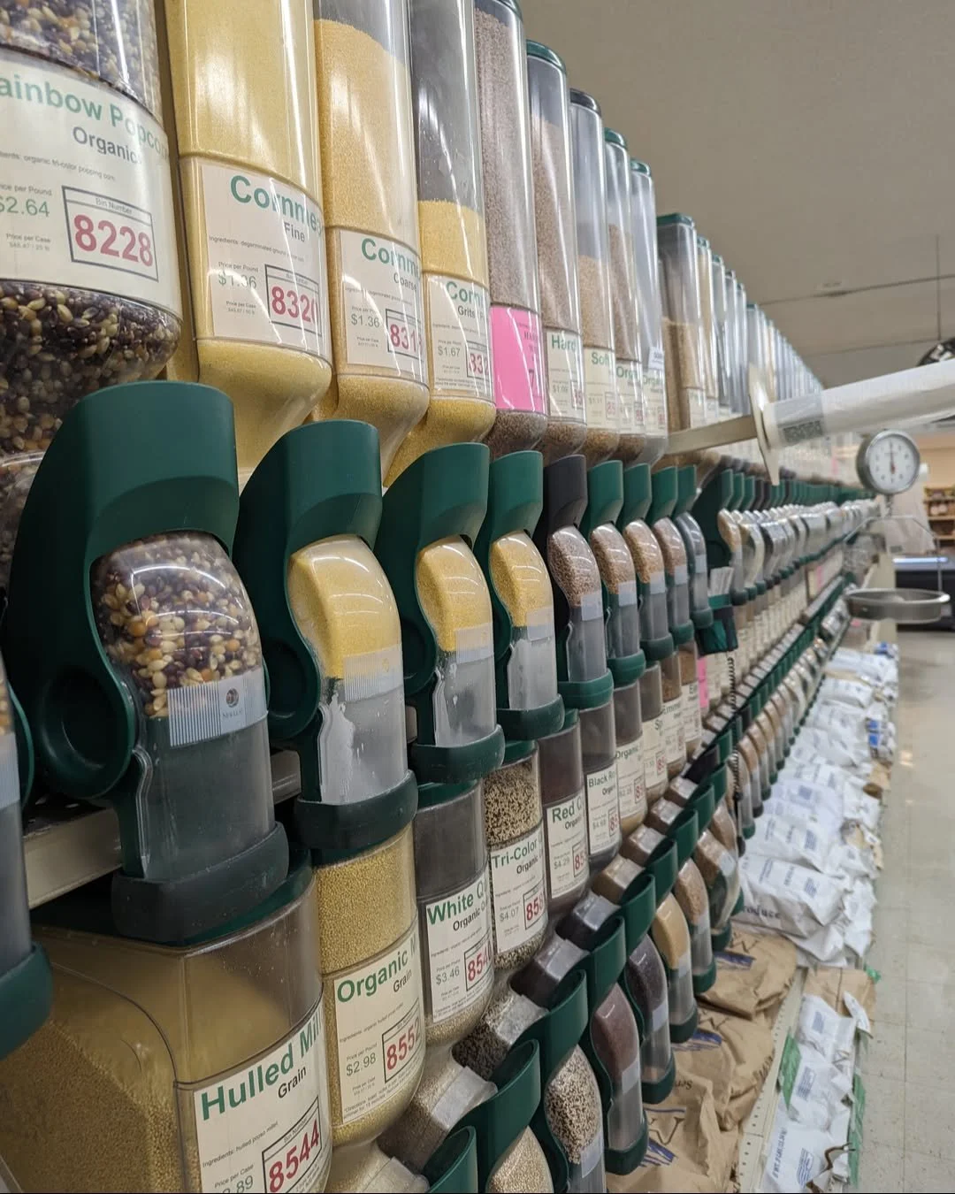 Bulk section of Andy's Market with various spices and grains.