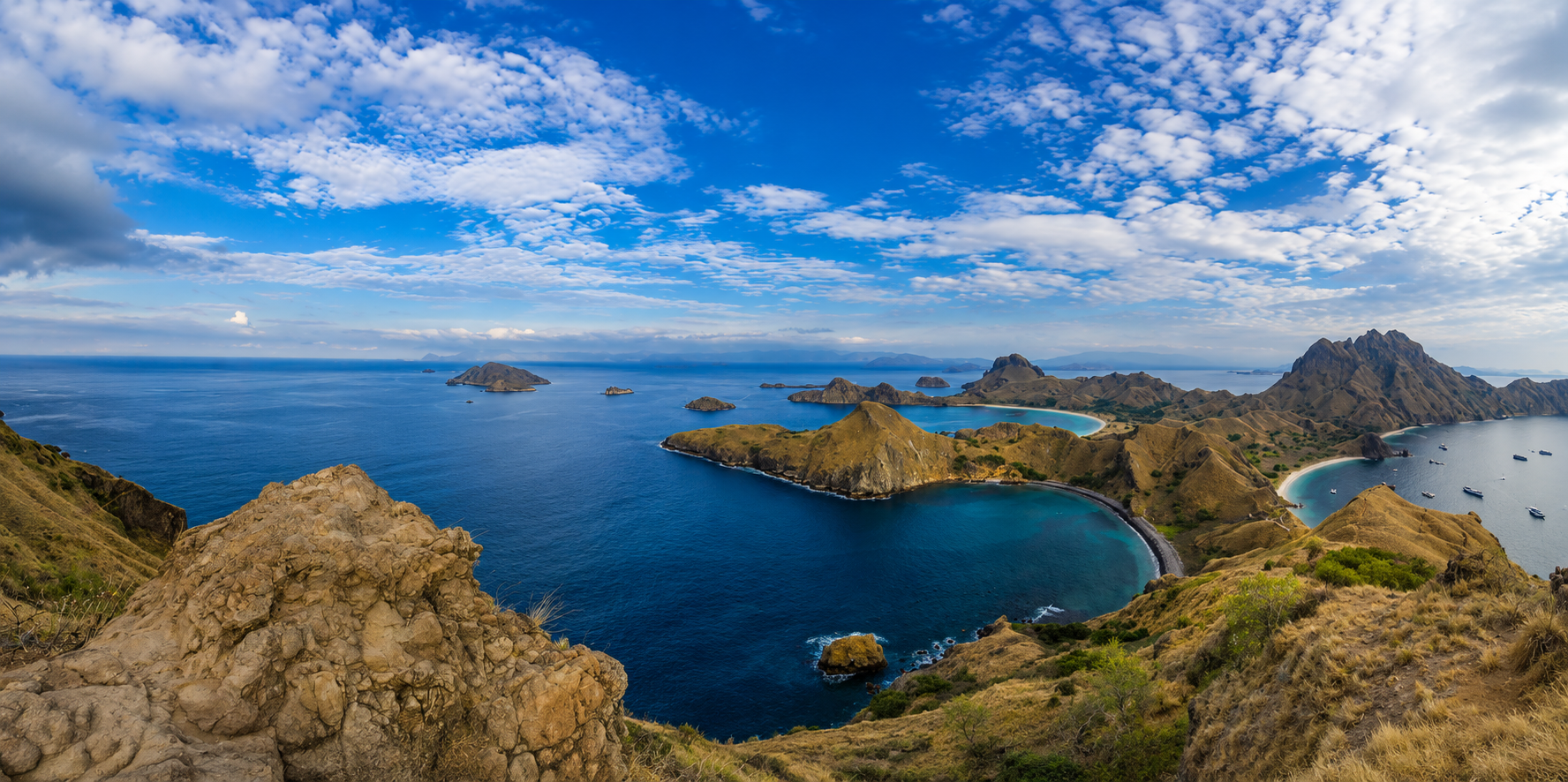 Panoramic view of Padar Island in Komodo National Park, Indonesia, with rugged islands and turquoise bays